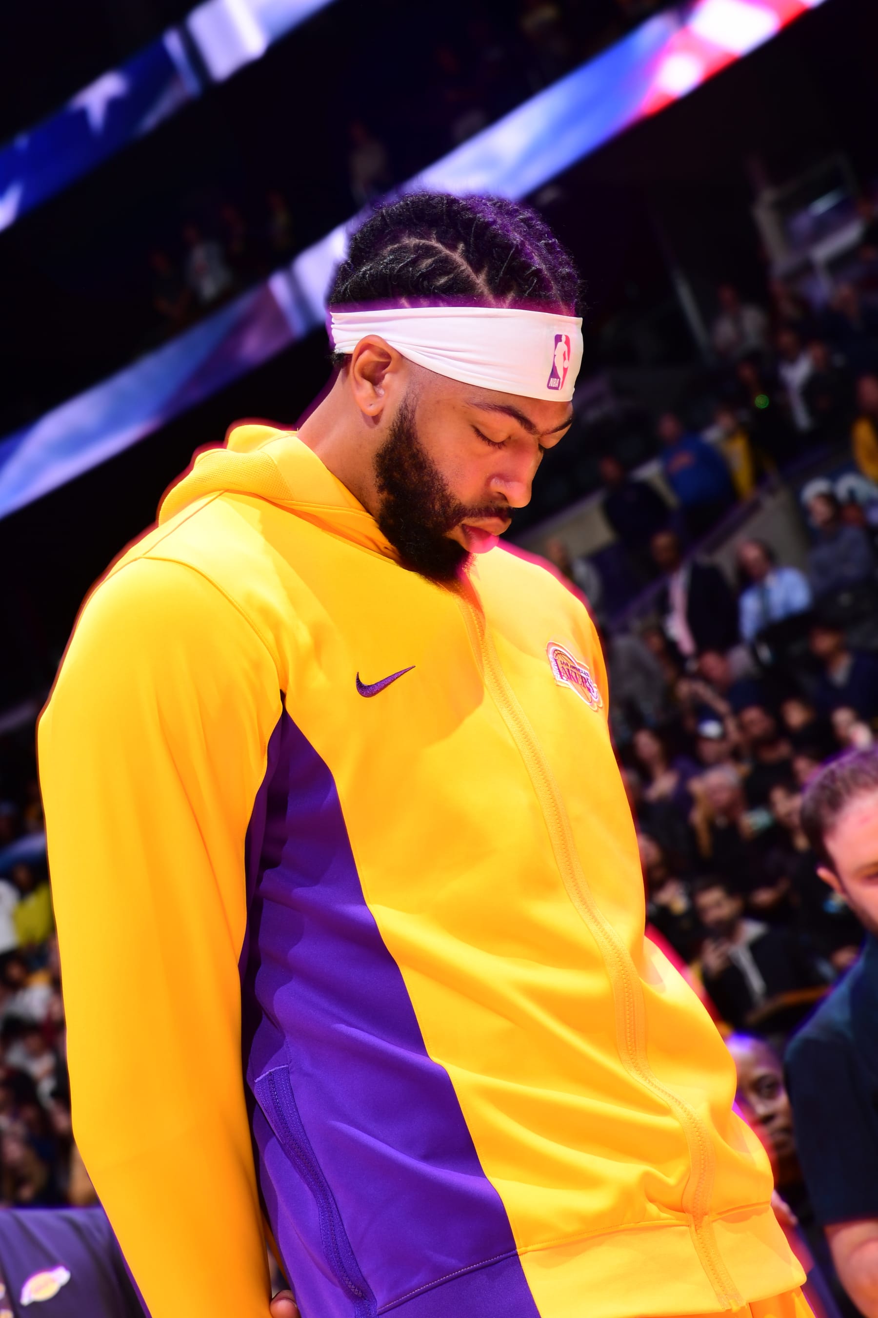 LOS ANGELES, CA - APRIL 6: (EDITOR'S NOTE - this image was captured with a slow shutter speed) Anthony Davis #3 of the Los Angeles Lakers stands for the National Anthem before the game against the Cleveland Cavaliers on April 6, 2024 at Crypto.Com Arena in Los Angeles, California. NOTE TO USER: User expressly acknowledges and agrees that, by downloading and/or using this Photograph, user is consenting to the terms and conditions of the Getty Images License Agreement. Mandatory Copyright Notice: Copyright 2024 NBAE (Photo by Adam Pantozzi/NBAE via Getty Images)