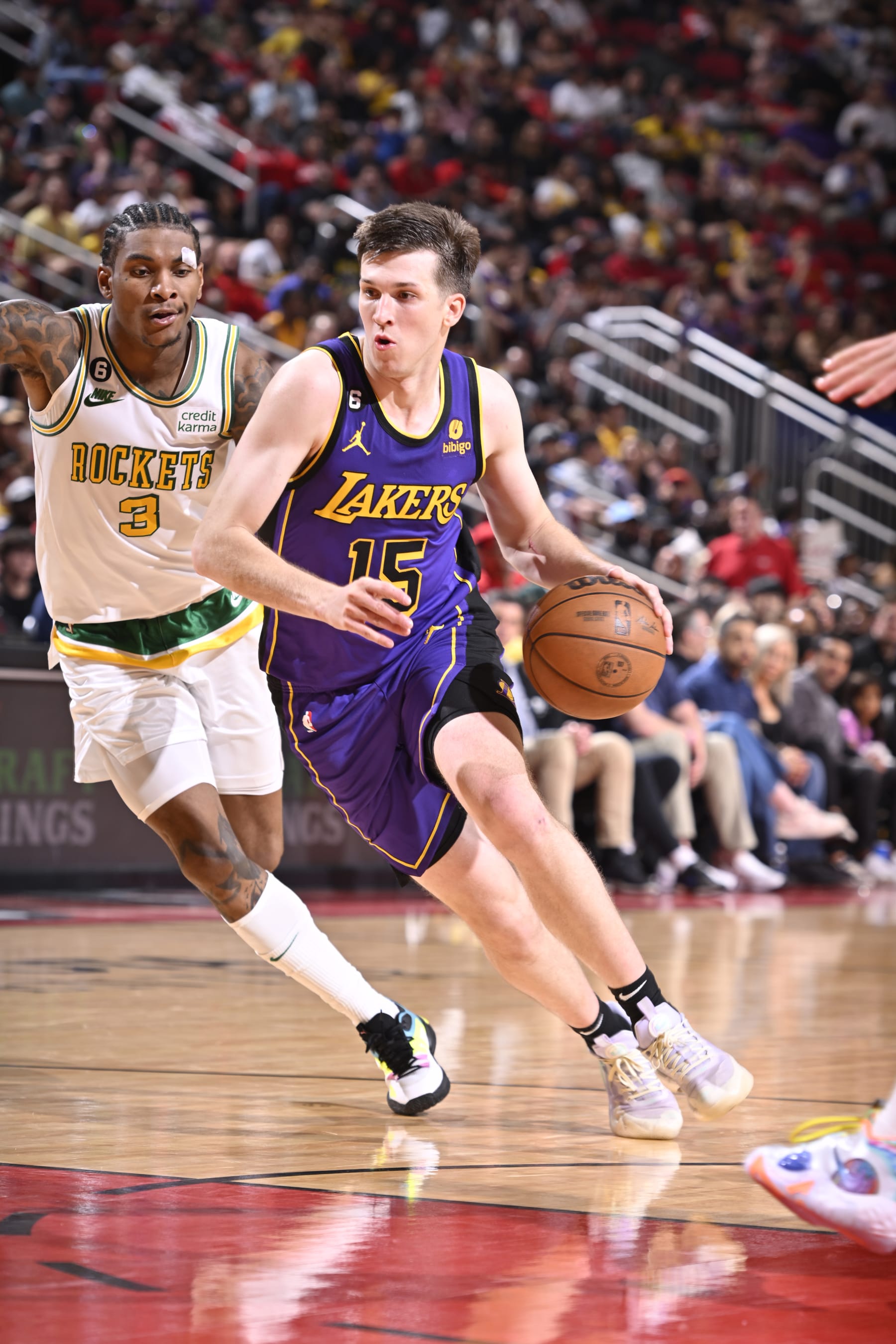 HOUSTON, TX - APRIL 2:   Austin Reaves #15 of the Los Angeles Lakers goes to the basket during the game on April 2, 2023 at the Toyota Center in Houston, Texas. NOTE TO USER: User expressly acknowledges and agrees that, by downloading and or using this photograph, User is consenting to the terms and conditions of the Getty Images License Agreement. Mandatory Copyright Notice: Copyright 2023 NBAE (Photo by Logan Riely/NBAE via Getty Images)