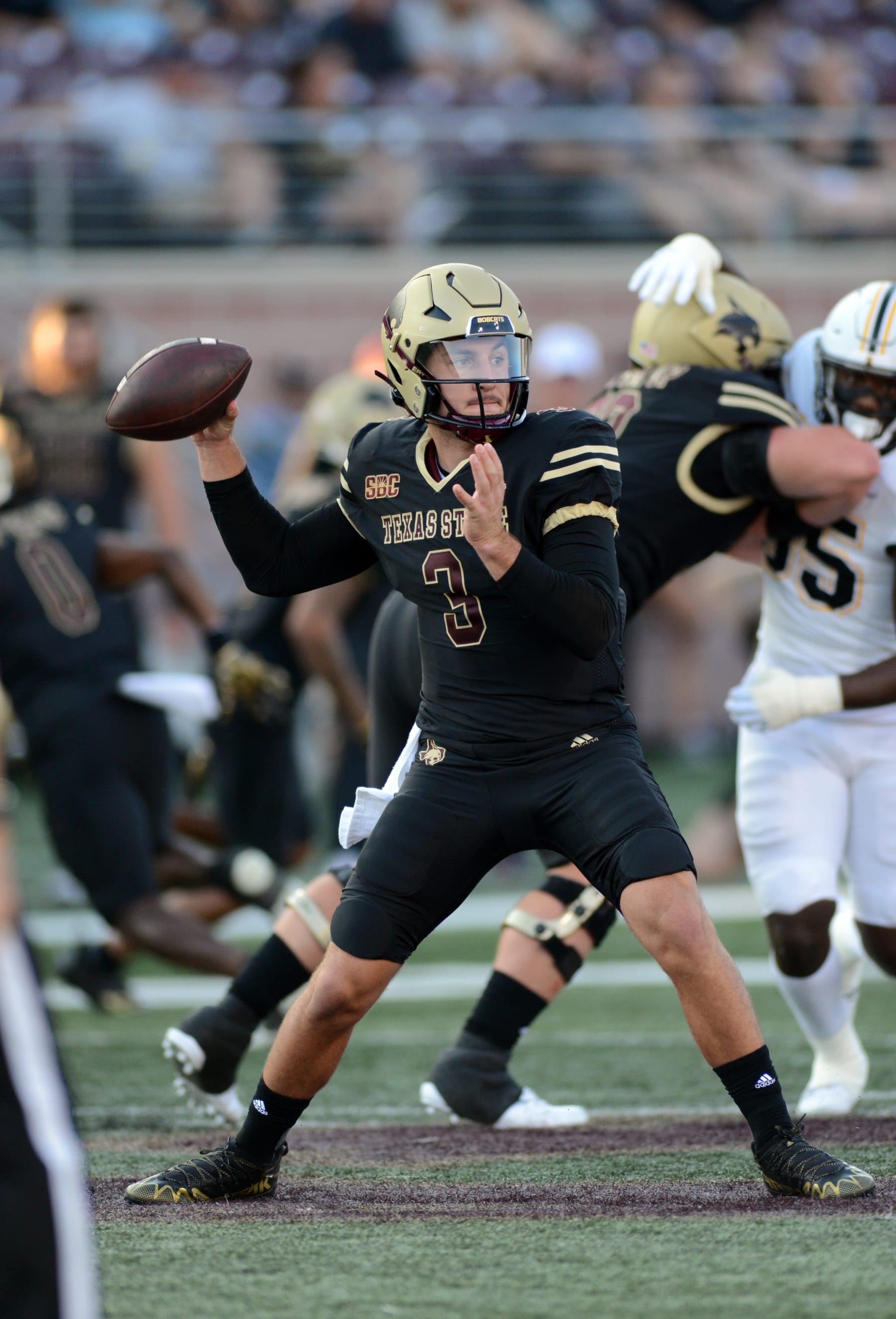 SAN MARCOS, TX - OCTOBER 08: Texas State Bobcats QB Layne Hatcher throws a pass during Sun Belt Conference game featuring the Appalachian State Mountaineers the Texas State Bobcats on October 8, 2022 at Bobcat Stadium in San Marcos, TX. (Photo by John Rivera/Icon Sportswire via Getty Images)