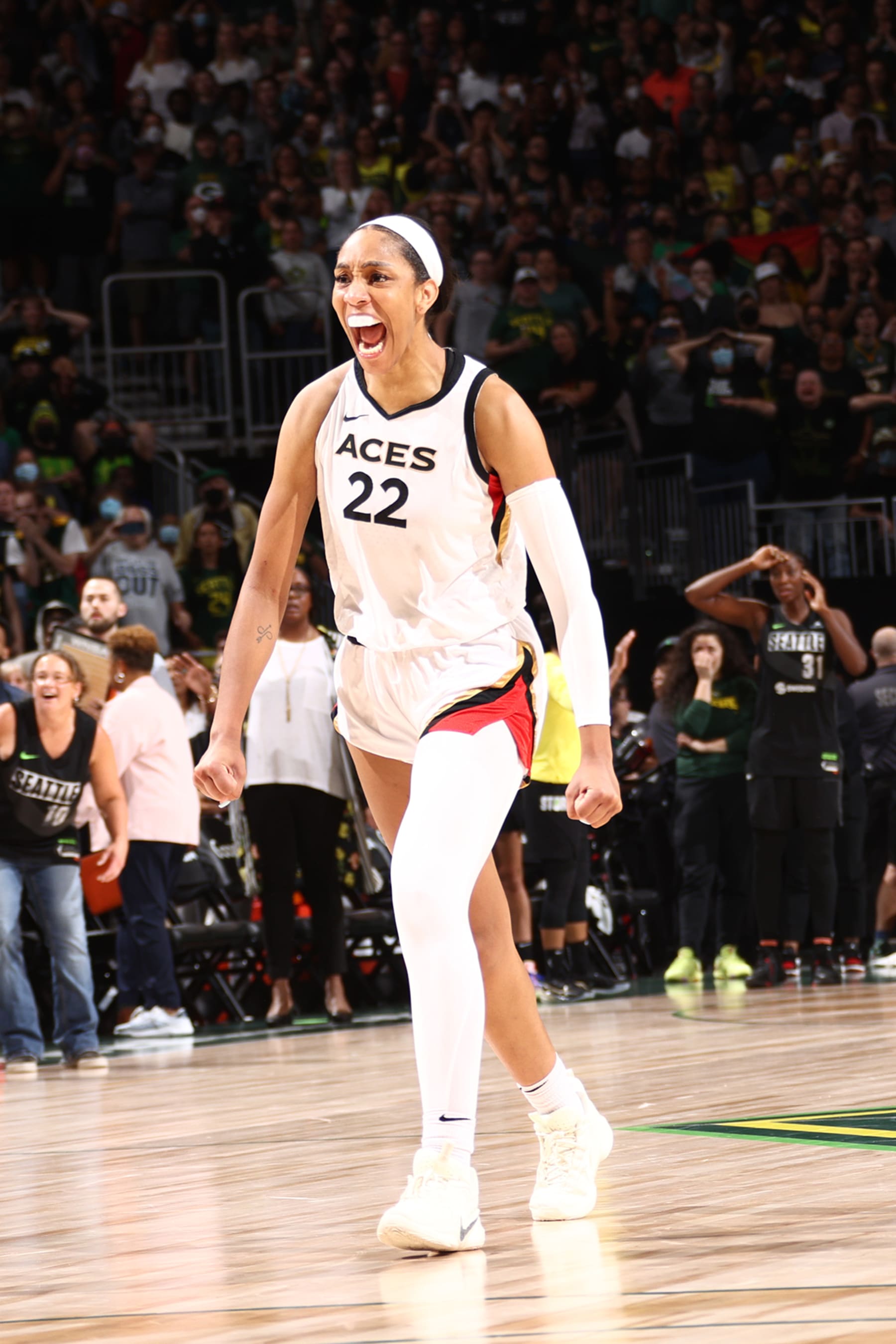 SEATTLE, WA - SEPTEMBER 4: A'ja Wilson #22 of the Las Vegas Aces celebrates a ply during the game against the Seattle Storm during Round 2 Game 3 of the 2022 WNBA Playoffs on September 4, 2022 at the Climate Pledge Arena in Seattle, Washington. NOTE TO USER: User expressly acknowledges and agrees that, by downloading and or using this photograph, User is consenting to the terms and conditions of the Getty Images License Agreement. Mandatory Copyright Notice: Copyright 2022 NBAE (Photo by Ned Dishman/NBAE via Getty Images)