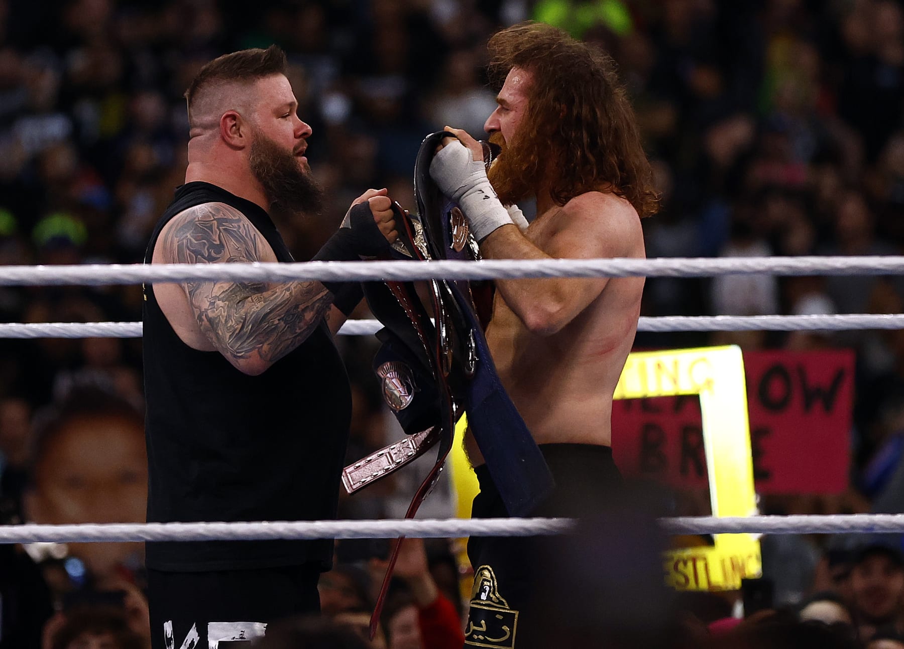 INGLEWOOD, CALIFORNIA - APRIL 01: Kevin Owens and Sami Zayn after defeating The Usos for the Undisputed WWE tag team championship during WrestleMania Goes Hollywood at SoFi Stadium on April 01, 2023 in Inglewood, California. (Photo by Ronald Martinez/Getty Images)
