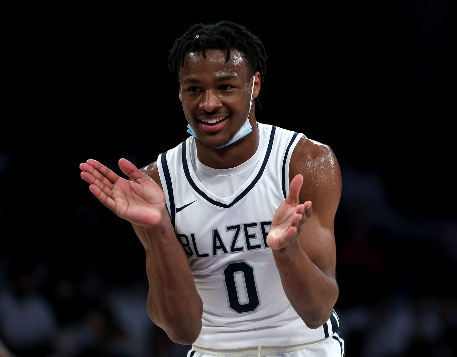 LOS ANGELES, CALIFORNIA - DECEMBER 04: Bronny James #0 of Sierra Canyon reacts after a basket against St. Vincent - St. Mary during The Chosen-1's Invitational at Staples Center on December 04, 2021 in Los Angeles, California. (Photo by Harry How/Getty Images)