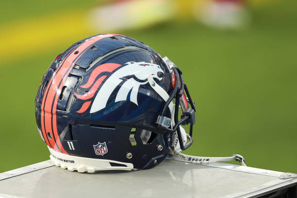 INGLEWOOD, CALIFORNIA - DECEMBER 27: A Denver Broncos helmet sits on the bench before the start of the game between the Los Angeles Chargers and the Denver Broncos at SoFi Stadium on December 27, 2020 in Inglewood, California. (Photo by Joe Scarnici/Getty Images)