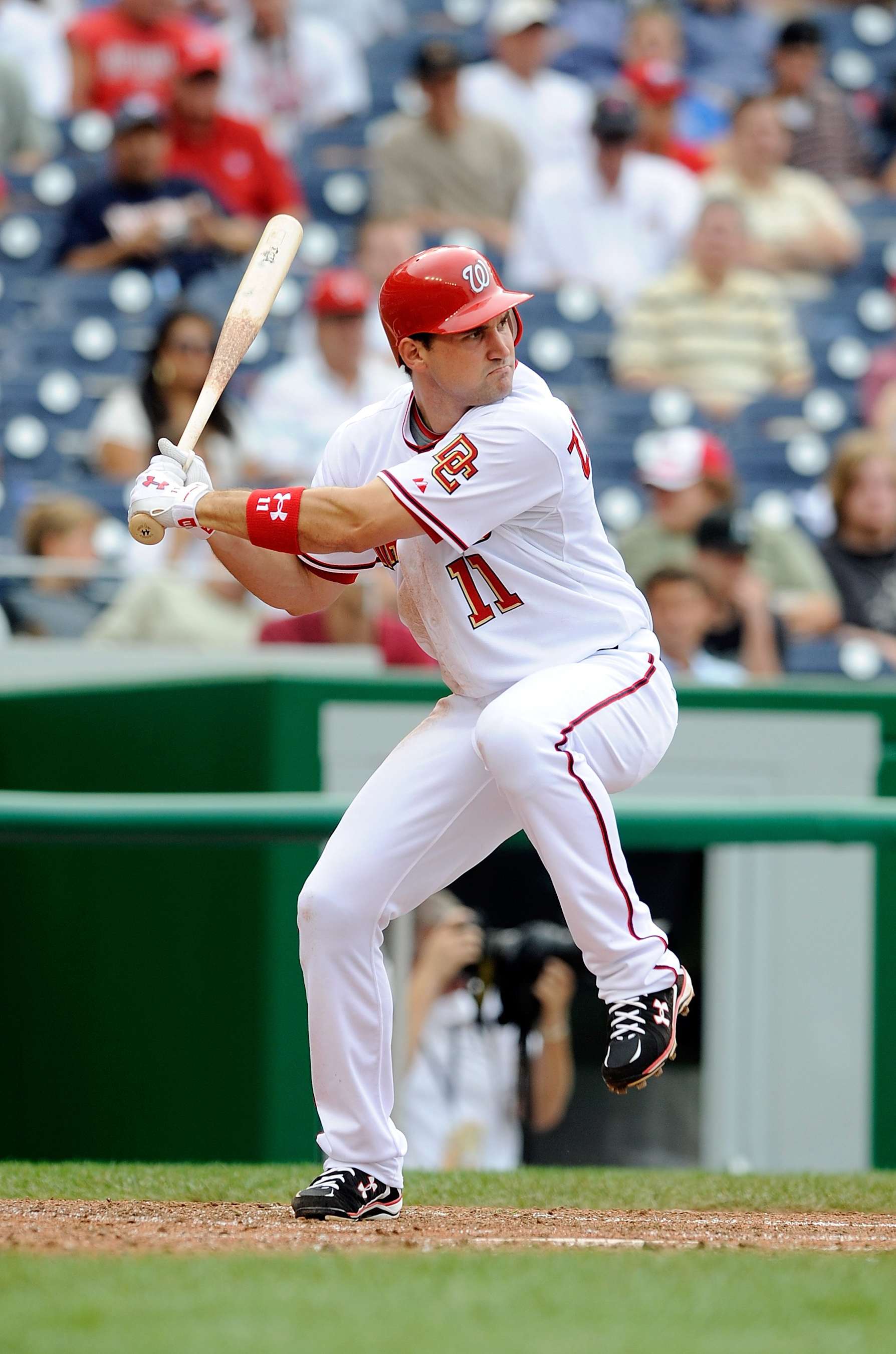WASHINGTON - AUGUST 06:  Ryan Zimmerman #11 of the Washington Nationals bats against the Florida Marlins at Nationals Park on August 6, 2009 in Washington, DC.  (Photo by G Fiume/Getty Images)
