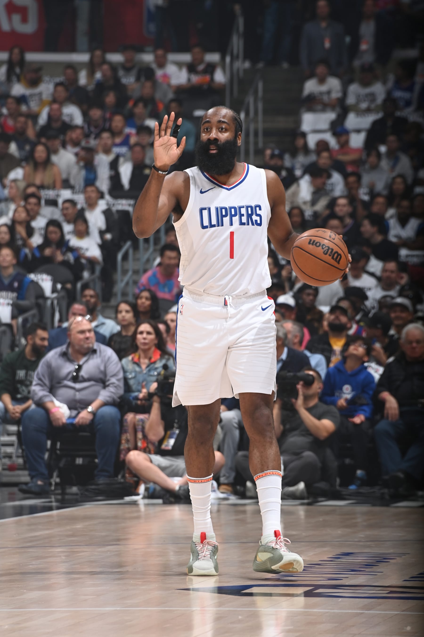 LOS ANGELES, CA - MAY 1:  James Harden #1 of the LA Clippers handles the ball during the game  against the Dallas Mavericks during Round 1 Game 5 of the 2024 NBA Playoffs  on May 1, 2024 at Crypto.Com Arena in Los Angeles, California. NOTE TO USER: User expressly acknowledges and agrees that, by downloading and/or using this Photograph, user is consenting to the terms and conditions of the Getty Images License Agreement. Mandatory Copyright Notice: Copyright 2024 NBAE (Photo by Andrew D. Bernstein/NBAE via Getty Images)