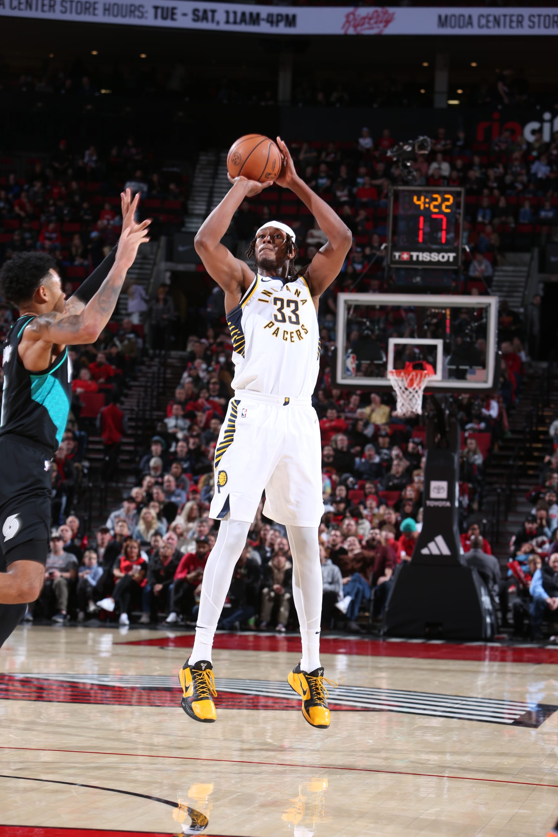 PORTLAND, OR - DECEMBER 4: Myles Turner #33 of the Indiana Pacers shoots a three point basket during the game against the Portland Trail Blazers on December 4, 2022 at the Moda Center Arena in Portland, Oregon. NOTE TO USER: User expressly acknowledges and agrees that, by downloading and or using this photograph, user is consenting to the terms and conditions of the Getty Images License Agreement. Mandatory Copyright Notice: Copyright 2022 NBAE (Photo by Sam Forencich/NBAE via Getty Images)
