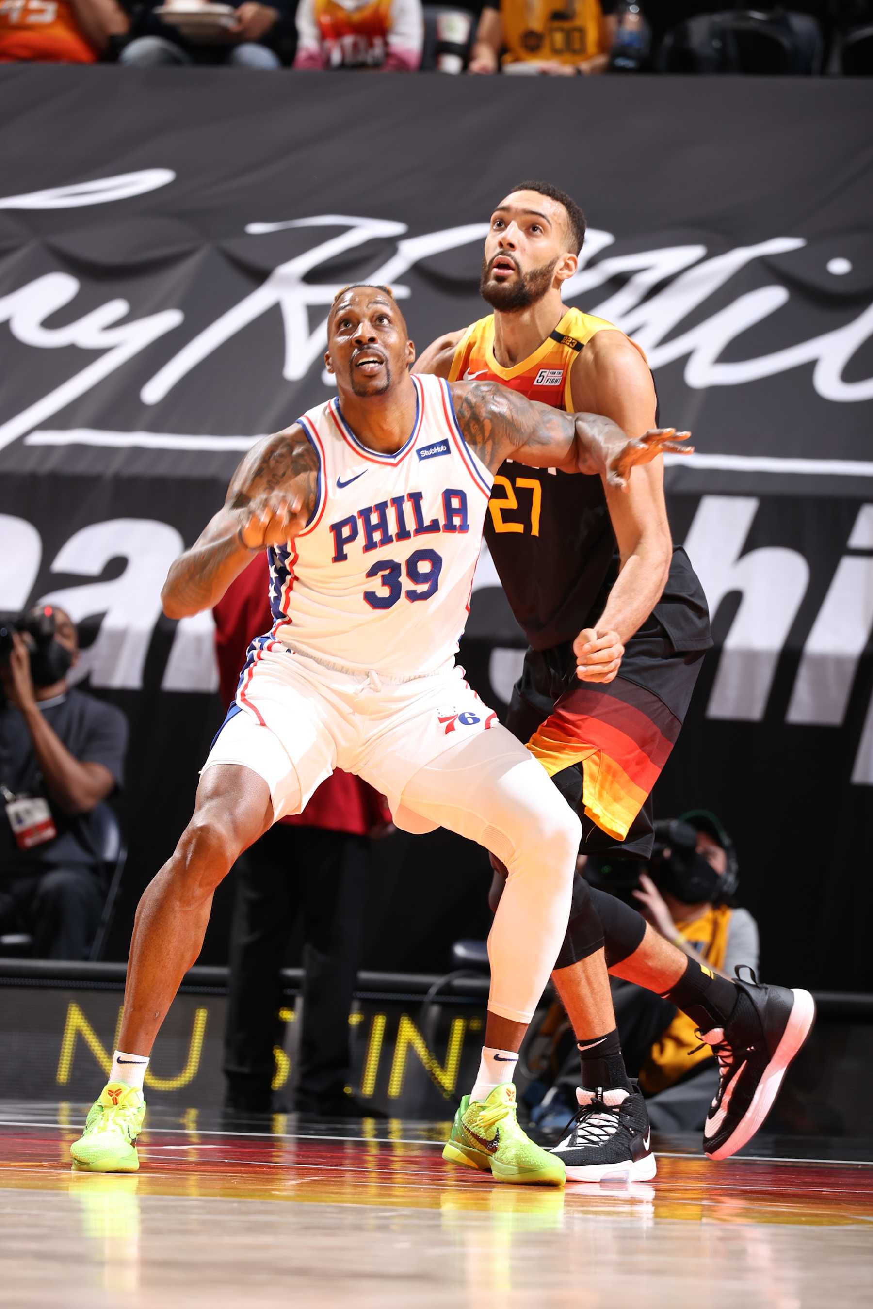 SALT LAKE CITY, UT - FEBRUARY 15: Dwight Howard #39 of the Philadelphia 76ers and Rudy Gobert #27 of the Utah Jazz look on during the game on February 15, 2021 at vivint.SmartHome Arena in Salt Lake City, Utah. NOTE TO USER: User expressly acknowledges and agrees that, by downloading and or using this Photograph, User is consenting to the terms and conditions of the Getty Images License Agreement. Mandatory Copyright Notice: Copyright 2021 NBAE (Photo by Melissa Majchrzak/NBAE via Getty Images)