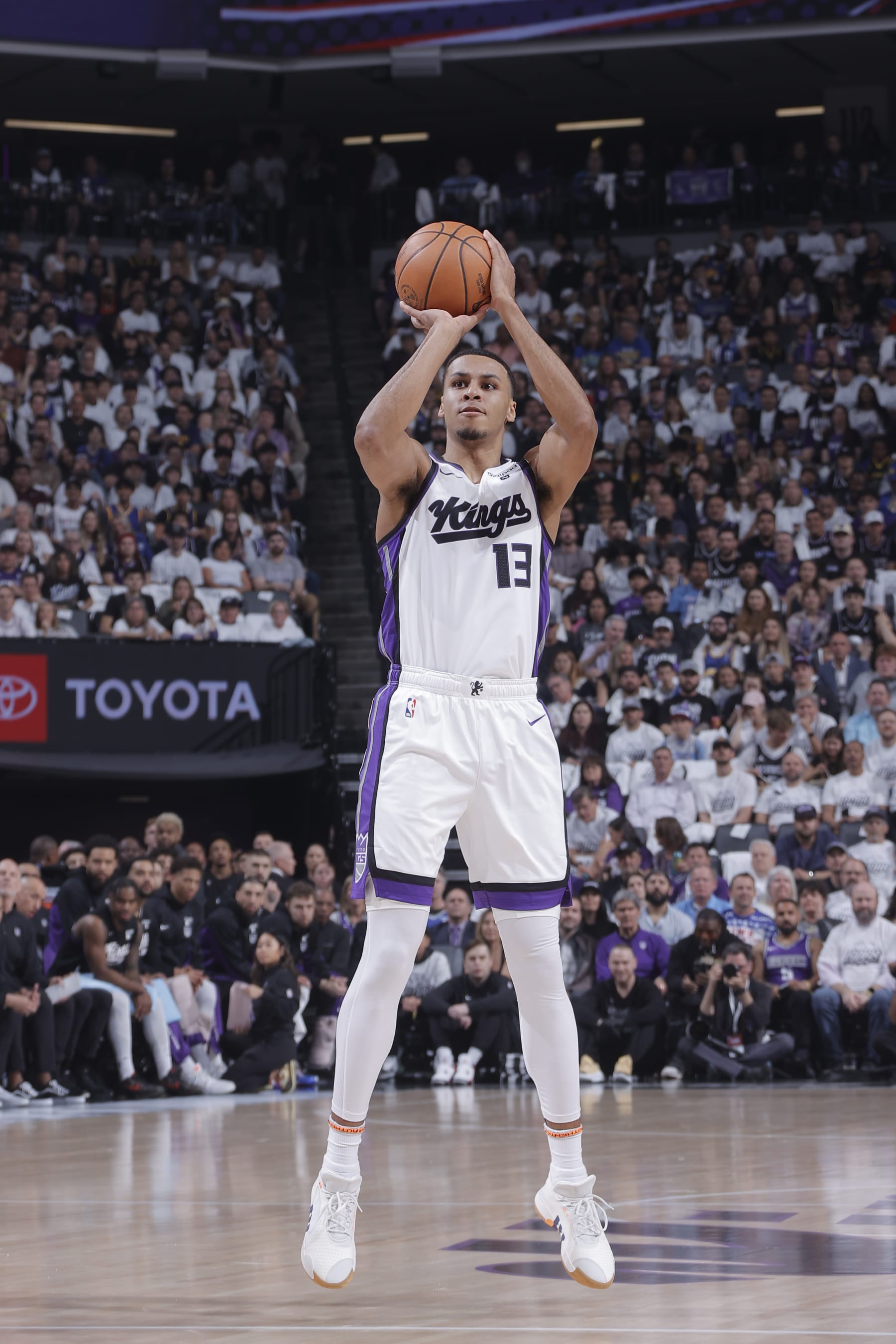 SACRAMENTO, CA - APRIL 16:Keegan Murray #13 of the Sacramento Kings shoots a three point basket during the game against the Golden State Warriors  during the 2024 Play-In Tournament on April 16, 2024 at Golden 1 Center in Sacramento, California. NOTE TO USER: User expressly acknowledges and agrees that, by downloading and or using this Photograph, user is consenting to the terms and conditions of the Getty Images License Agreement. Mandatory Copyright Notice: Copyright 2024 NBAE (Photo by Rocky Widner/NBAE via Getty Images)
