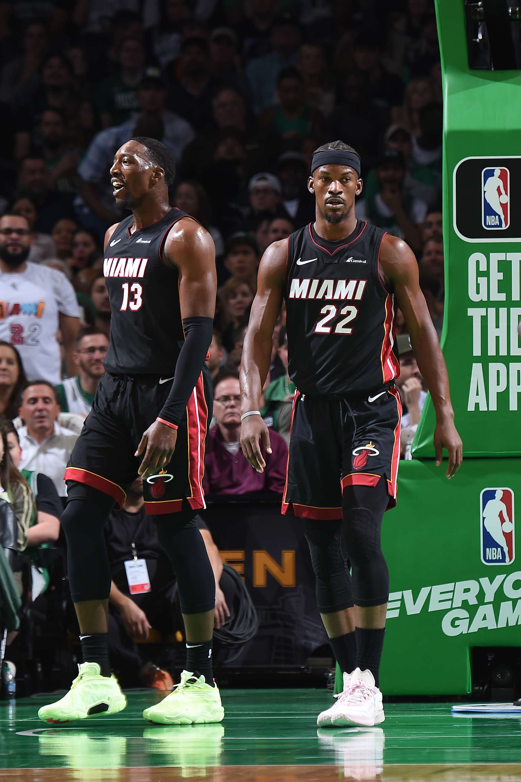 BOSTON, MA - OCTOBER 27: Bam Adebayo #13 and Jimmy Butler #22 of the Miami Heat look on during the game against the Boston Celtics on October 27, 2023 at the TD Garden in Boston, Massachusetts. NOTE TO USER: User expressly acknowledges and agrees that, by downloading and or using this photograph, User is consenting to the terms and conditions of the Getty Images License Agreement. Mandatory Copyright Notice: Copyright 2023 NBAE  (Photo by Brian Babineau/NBAE via Getty Images)