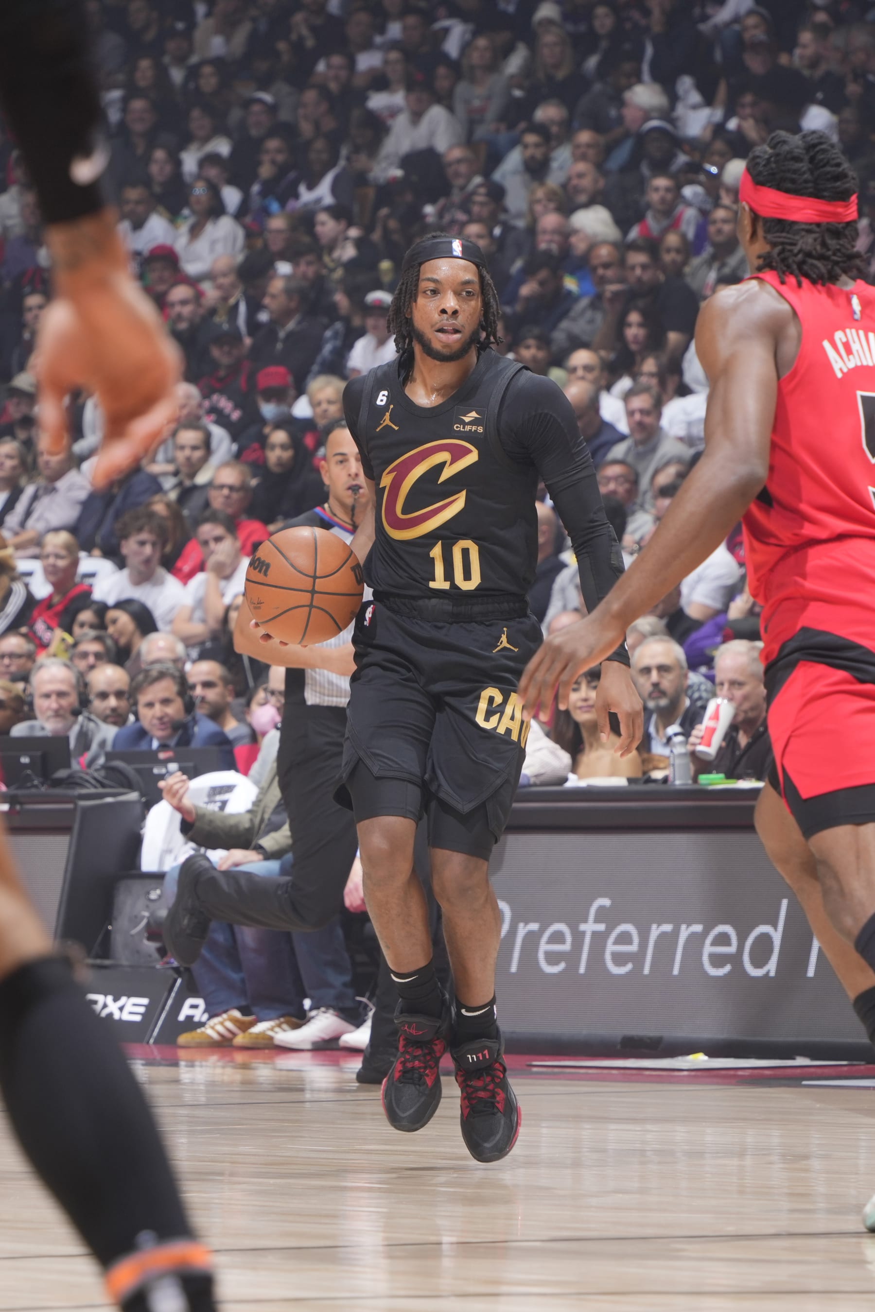 TORONTO, CANADA - OCTOBER 19: Darius Garland #10 of the Cleveland Cavaliers dribbles the ball during the game against the Toronto Raptors on October 19, 2022 at the Scotiabank Arena in Toronto, Ontario, Canada.  NOTE TO USER: User expressly acknowledges and agrees that, by downloading and or using this Photograph, user is consenting to the terms and conditions of the Getty Images License Agreement.  Mandatory Copyright Notice: Copyright 2022 NBAE (Photo by Mark Blinch/NBAE via Getty Images)