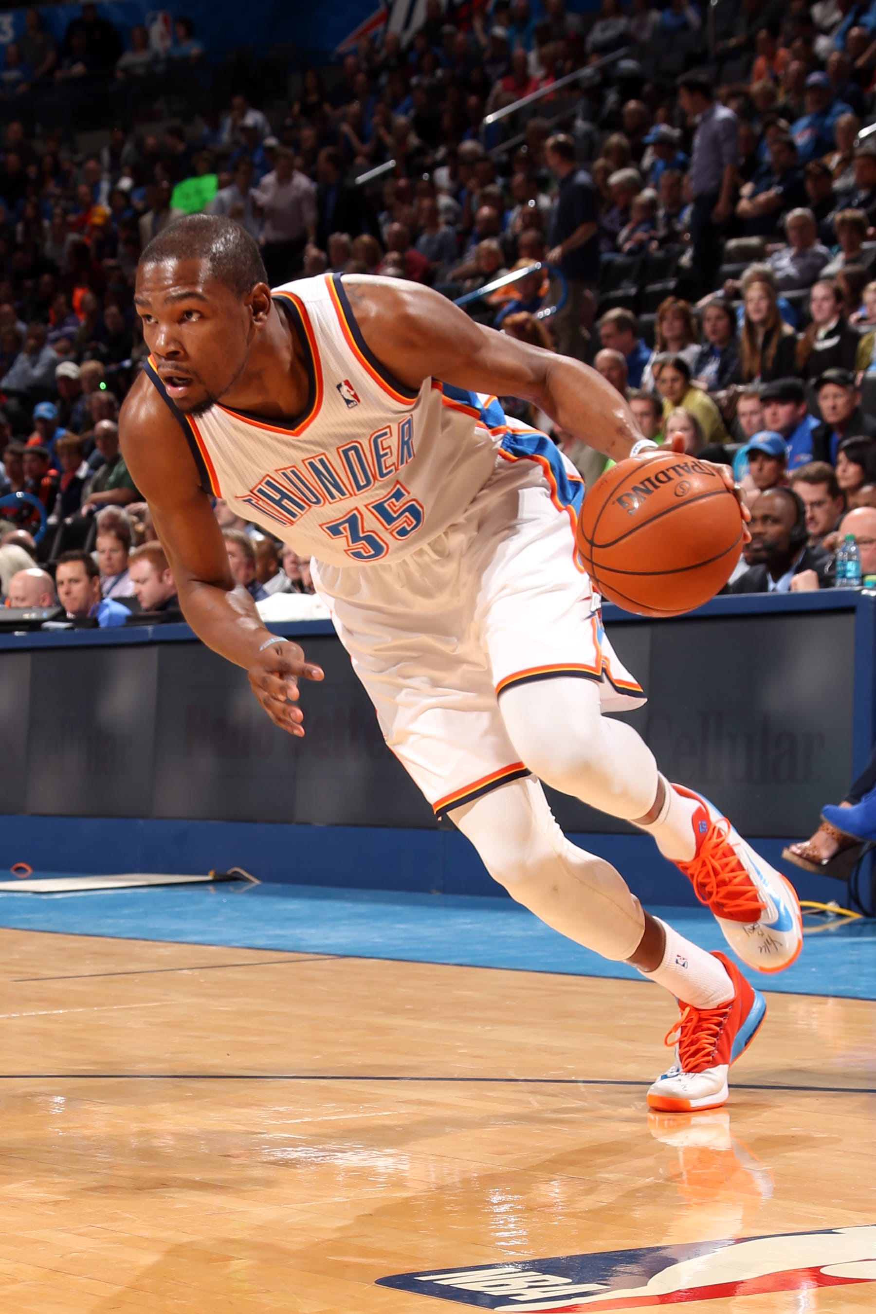 OKLAHOMA CITY, OK - MARCH 24: Kevin Durant #35 of the Oklahoma City Thunder drives to the basket against the Denver Nuggets on March 24, 2014 at the Chesapeake Energy Arena in Oklahoma City, Oklahoma. NOTE TO USER: User expressly acknowledges and agrees that, by downloading and or using this Photograph, user is consenting to the terms and conditions of the Getty Images License Agreement. Mandatory Copyright Notice: Copyright 2014 NBAE (Photo by Layne Murdoch/NBAE via Getty Images)