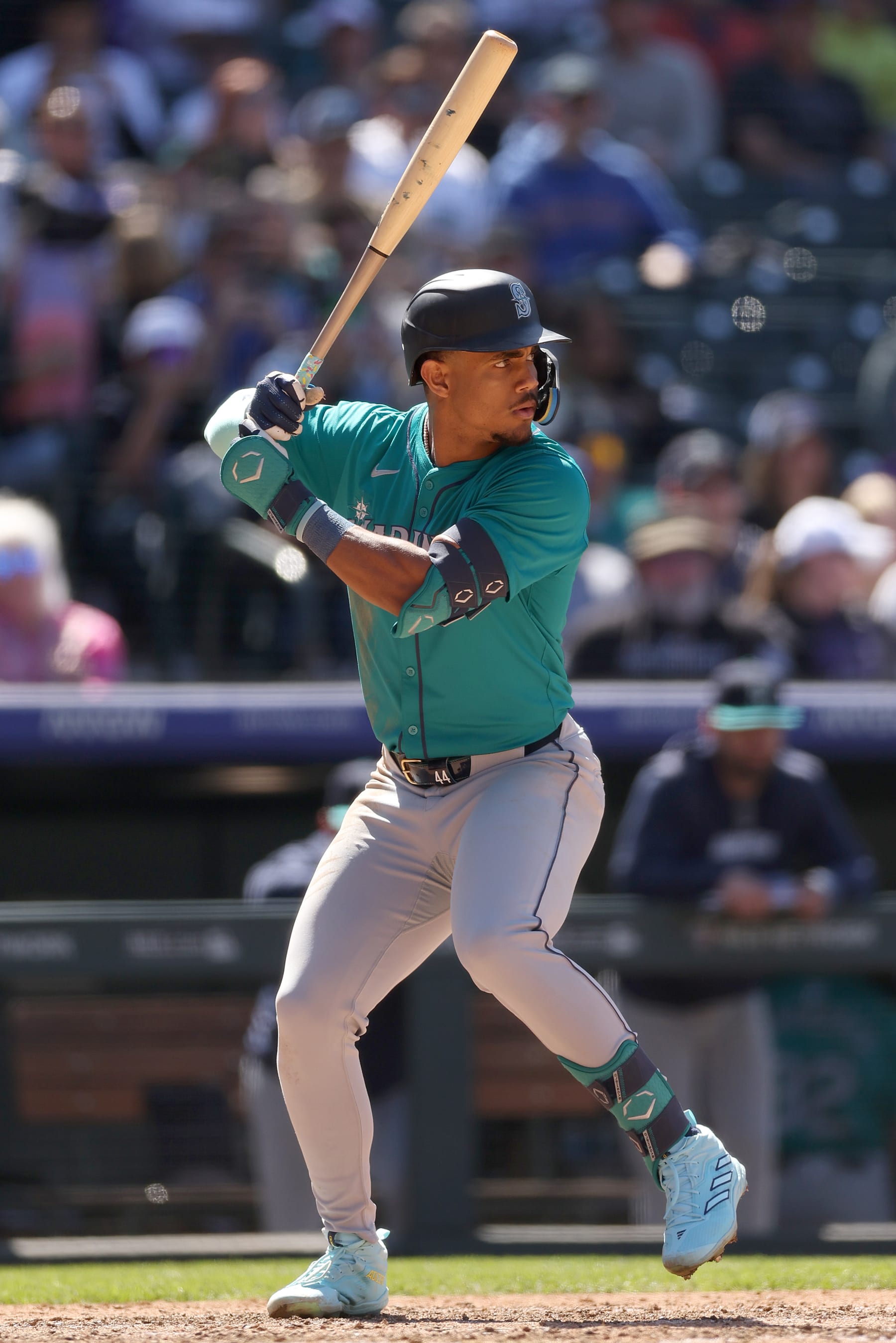 DENVER, COLORADO - APRIL 21: Julio Rodriguez #44 of the Seattle Mariners bats against the Colorado Rockies in the seventh inning during game one of a double header at Coors Field on April 21, 2024 in Denver, Colorado. (Photo by Matthew Stockman/Getty Images)