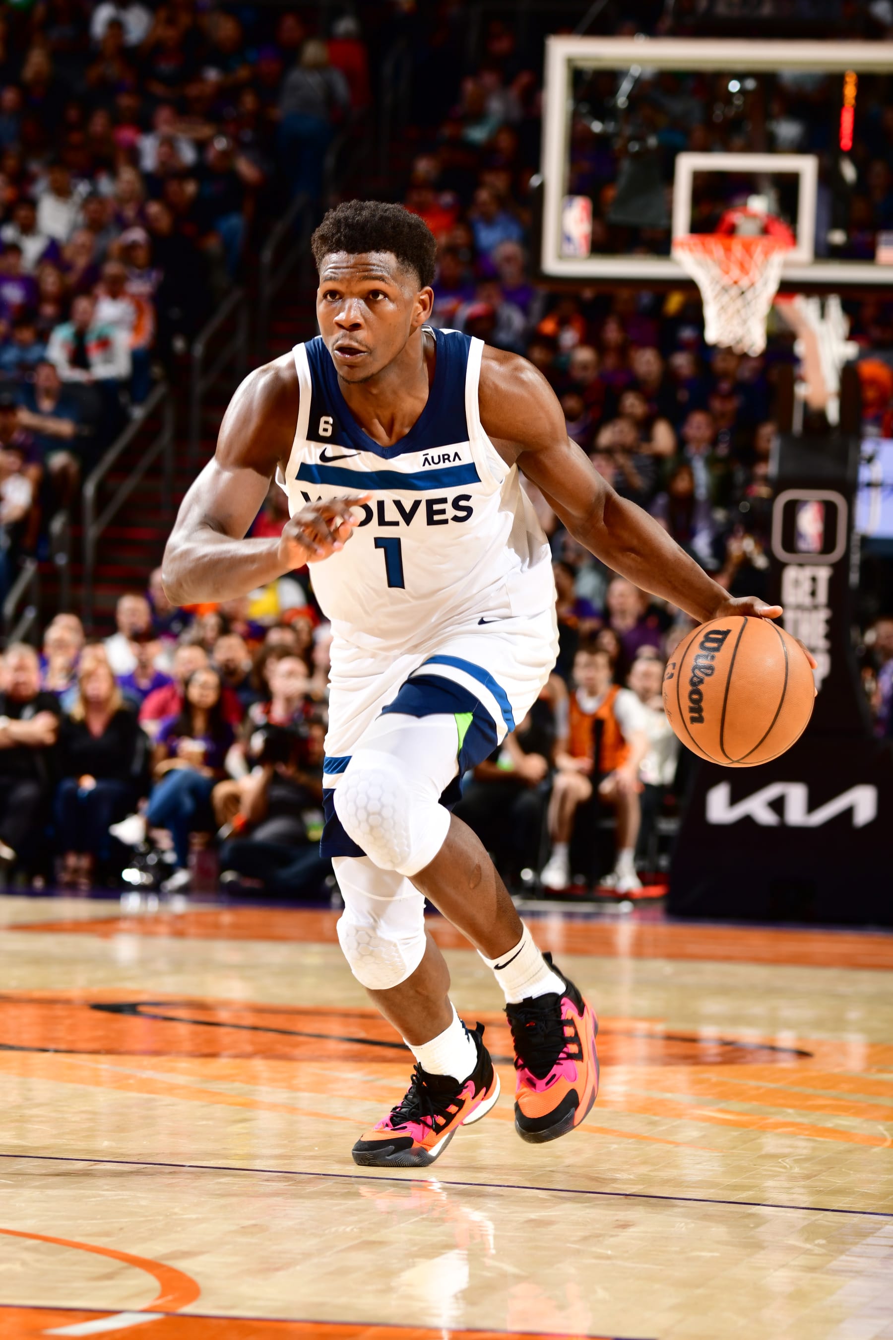 PHOENIX, AZ - MARCH 29: Anthony Edwards #1 of the Minnesota Timberwolves dribbles the ball during the game against the Phoenix Suns on March 29, 2022 at Footprint Center in Phoenix, Arizona. NOTE TO USER: User expressly acknowledges and agrees that, by downloading and or using this photograph, user is consenting to the terms and conditions of the Getty Images License Agreement. Mandatory Copyright Notice: Copyright 2022 NBAE (Photo by Barry Gossage/NBAE via Getty Images)