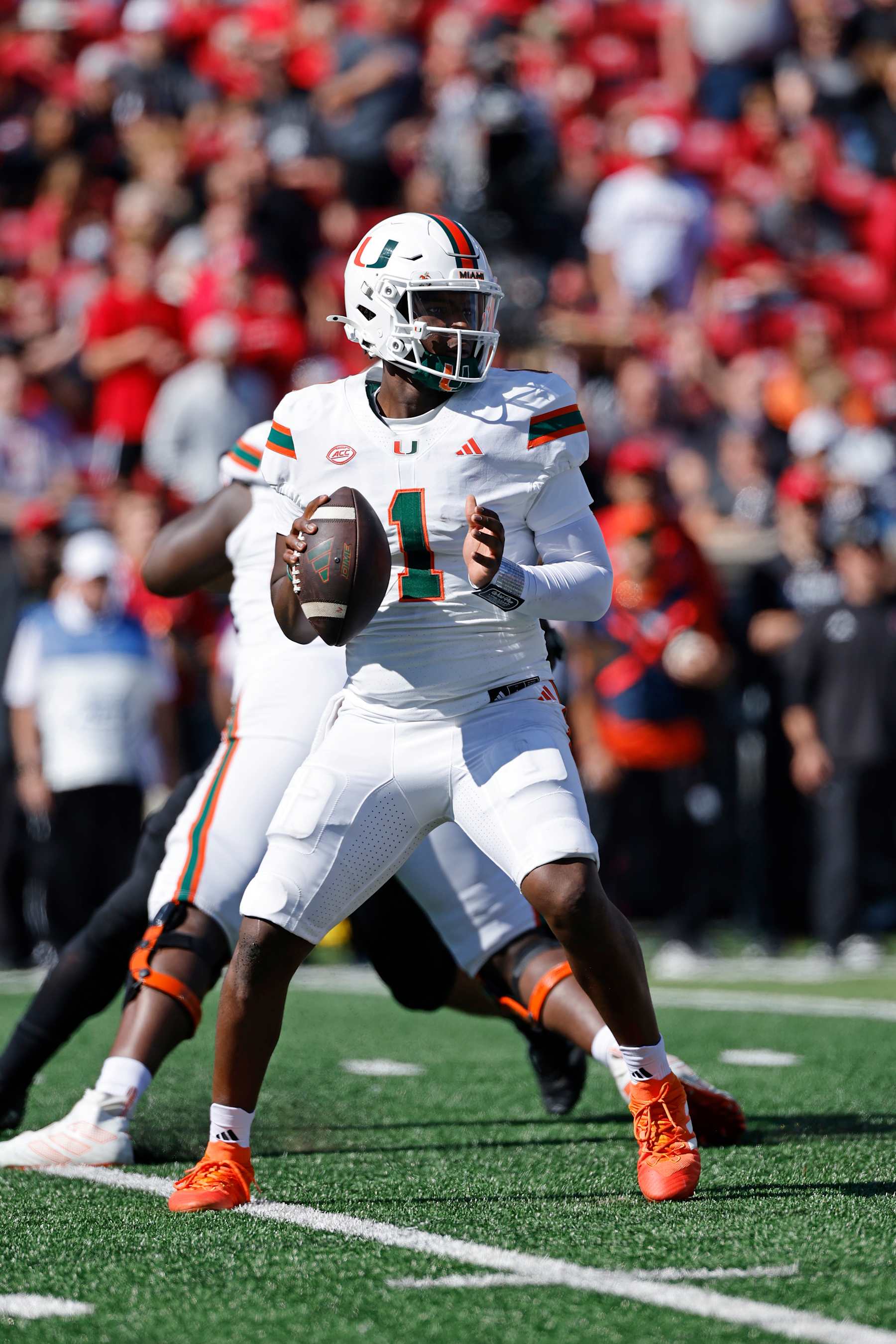 LOUISVILLE, KY - OCTOBER 19: Miami Hurricanes quarterback Cam Ward (1) drops back to pass during a college football game against the Louisville Cardinals on October 19, 2024 at L&N Federal Credit Union Stadium in Louisville, Kentucky. (Photo by Joe Robbins/Icon Sportswire via Getty Images)