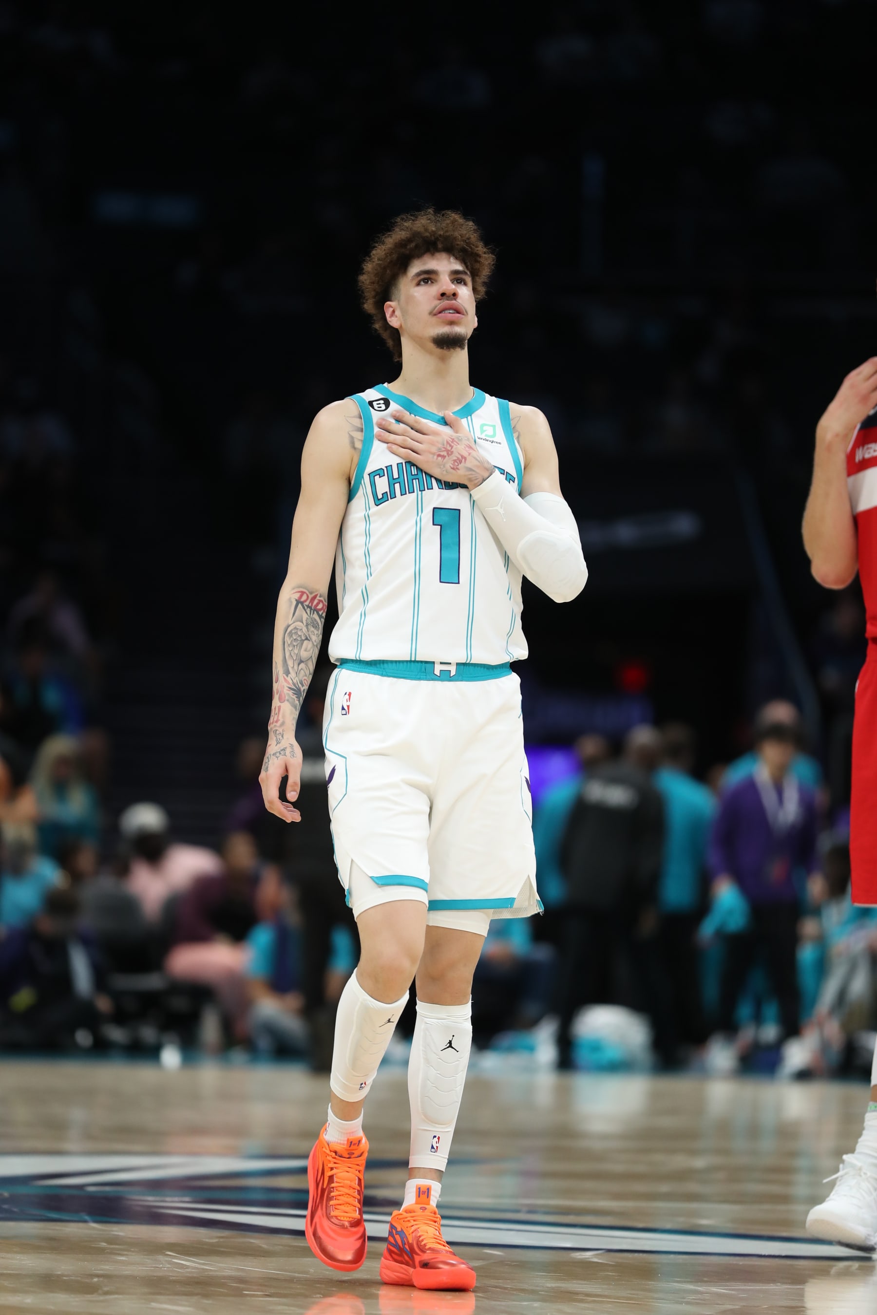 CHARLOTTE, NC - OCTOBER 10: LaMelo Ball #1 of the Charlotte Hornets stands on the court during a preseason game against the Washington Wizards on October 10, 2022 at Spectrum Center in Charlotte, North Carolina. NOTE TO USER: User expressly acknowledges and agrees that, by downloading and or using this photograph, User is consenting to the terms and conditions of the Getty Images License Agreement.  Mandatory Copyright Notice:  Copyright 2022 NBAE (Photo by Brock Williams-Smith/NBAE via Getty Images)