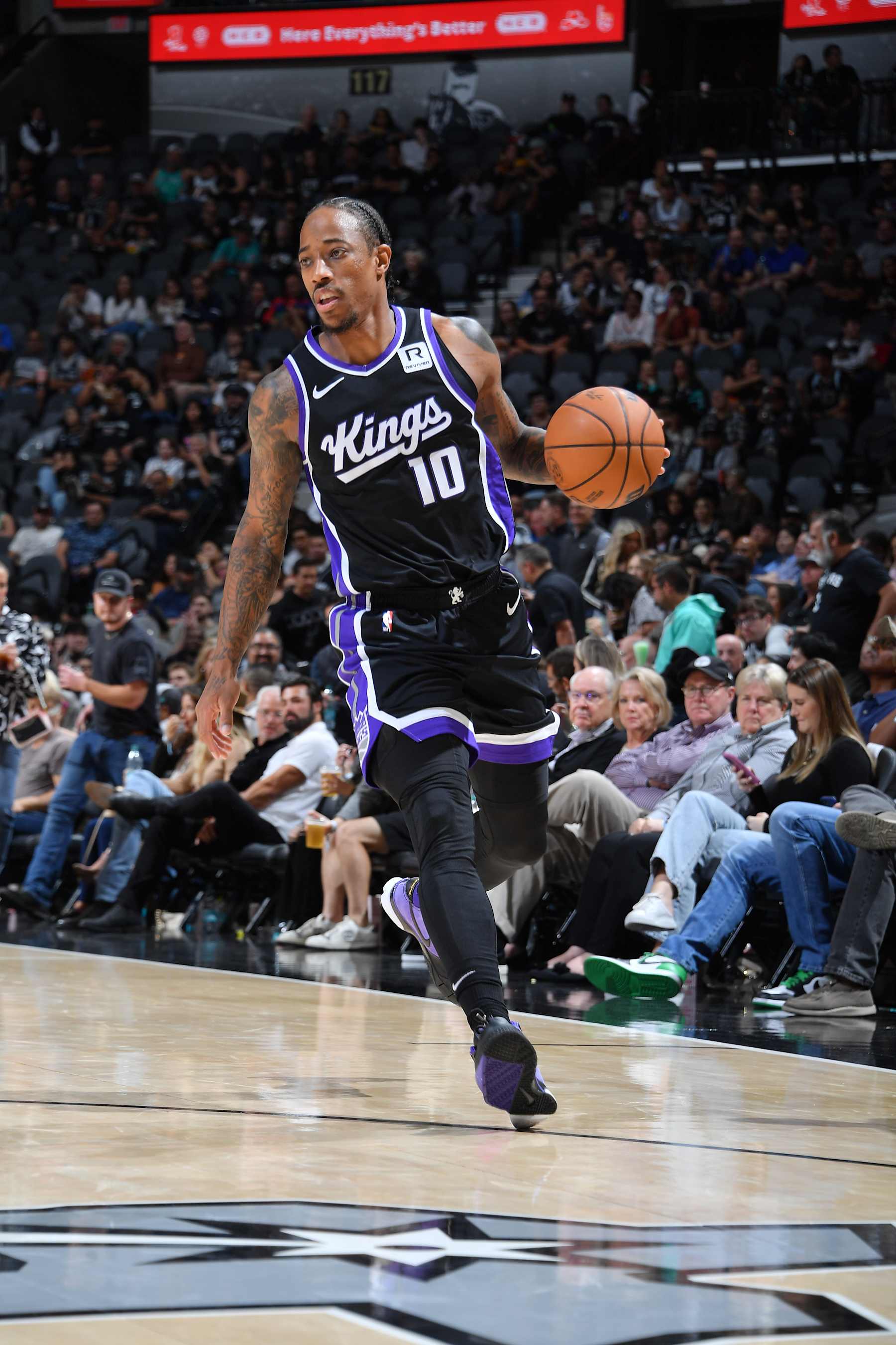 SAN ANTONIO, TX - NOVEMBER 11: DeMar DeRozan #10 of the Sacramento Kings dribbles the ball during the game against the San Antonio Spurs  during a regular season game on November 11, 2024 at the Frost Bank Center in San Antonio, Texas. NOTE TO USER: User expressly acknowledges and agrees that, by downloading and or using this photograph, user is consenting to the terms and conditions of the Getty Images License Agreement. Mandatory Copyright Notice: Copyright 2024 NBAE (Photos by Michael Gonzales/NBAE via Getty Images)