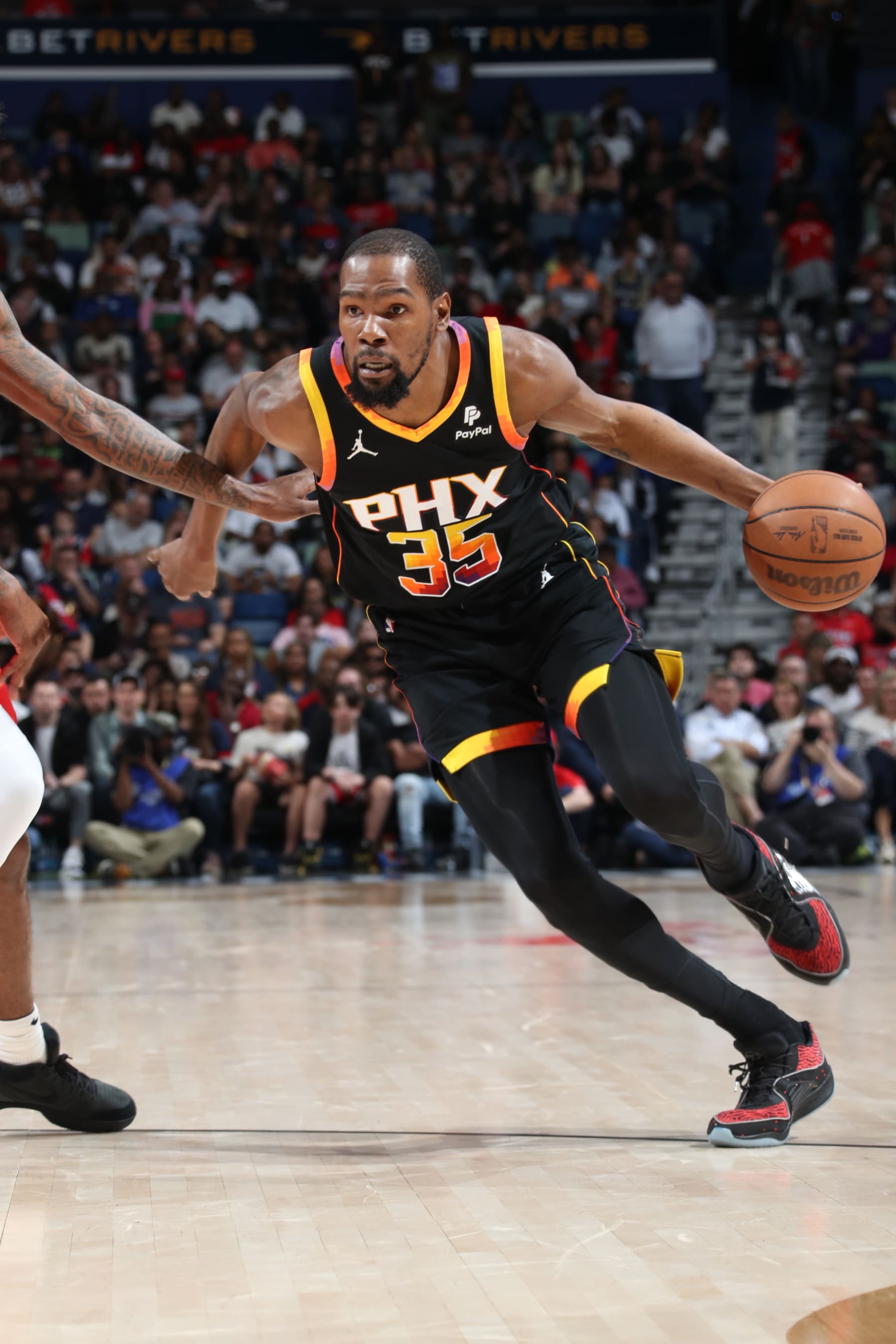 NEW ORLEANS, LA - APRIL 1: Kevin Durant #35 of the Phoenix Suns handles the ball during the game against the New Orleans Pelicans on April 1, 2024 at the Smoothie King Center in New Orleans, Louisiana. NOTE TO USER: User expressly acknowledges and agrees that, by downloading and or using this Photograph, user is consenting to the terms and conditions of the Getty Images License Agreement. Mandatory Copyright Notice: Copyright 2024 NBAE (Photo by Layne Murdoch Jr./NBAE via Getty Images)