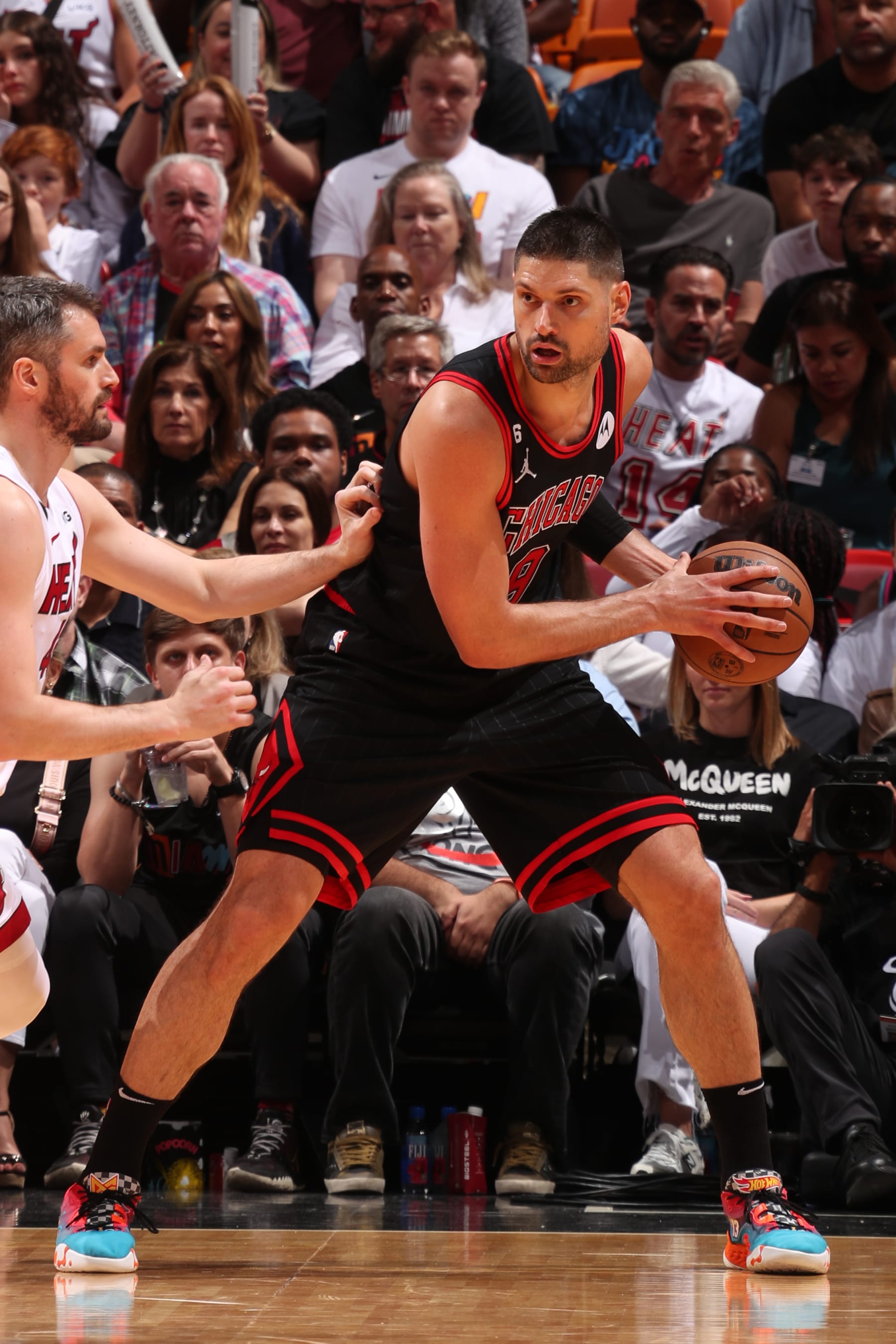 MIAMI, FL - APRIL 14: Nikola Vucevic #9 of the Chicago Bulls handles the ball during the game against the Miami Heat during the 2023 Play-In Tournament on April 14, 2023 at the Kaseya Center in Miami, Florida. NOTE TO USER: User expressly acknowledges and agrees that, by downloading and or using this Photograph, user is consenting to the terms and conditions of the Getty Images License Agreement. Mandatory Copyright Notice: Copyright 2023 NBAE (Photo by Issac Baldizon/NBAE via Getty Images)