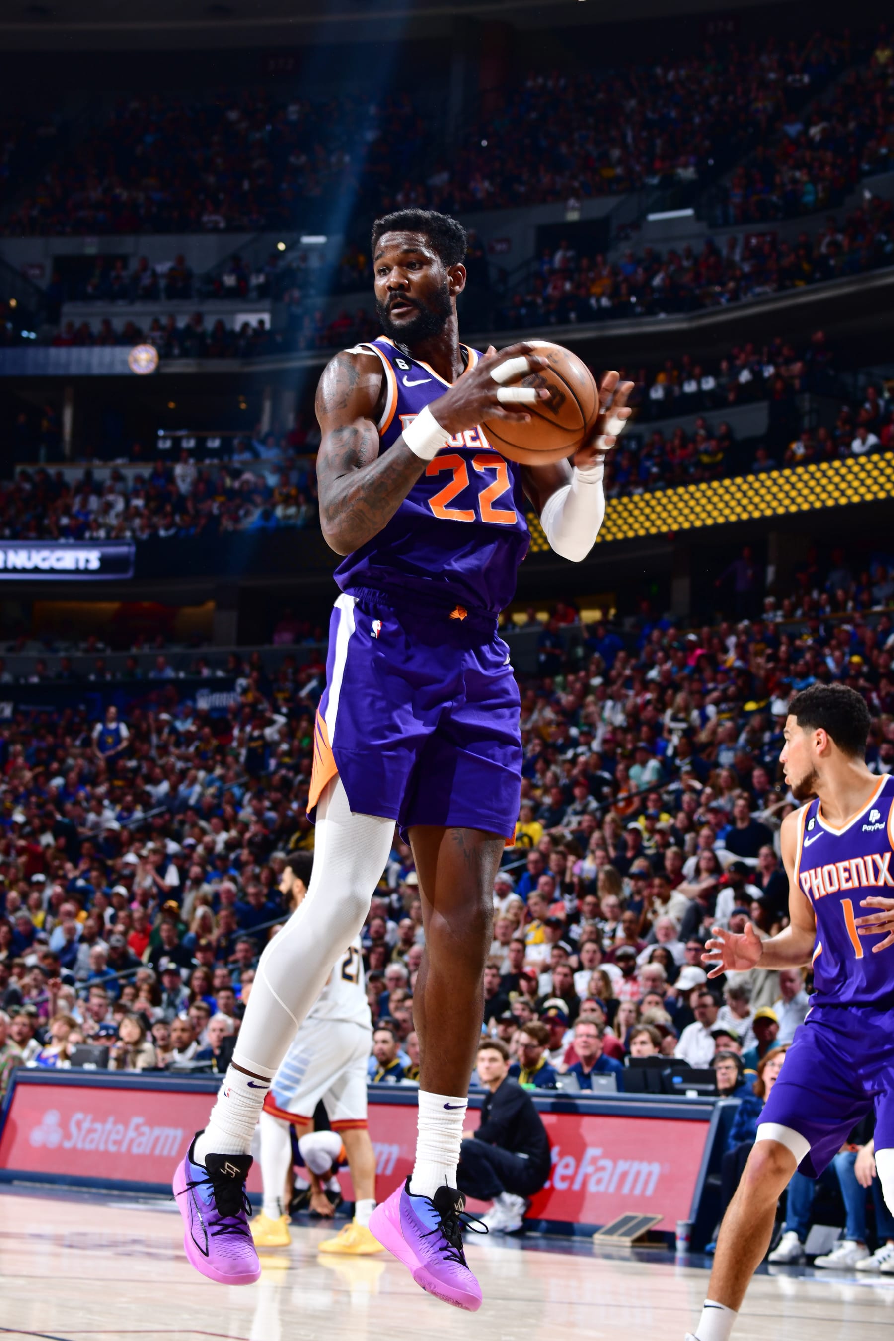 DENVER, CO - MAY 9: Deandre Ayton #22 of the Phoenix Suns rebounds the ball during the game against the Denver Nuggets during Game Five of the Western Conference Semi-Finals of the 2023 NBA Playoffs on May 9, 2023 at the Ball Arena in Denver, Colorado. NOTE TO USER: User expressly acknowledges and agrees that, by downloading and/or using this Photograph, user is consenting to the terms and conditions of the Getty Images License Agreement. Mandatory Copyright Notice: Copyright 2023 NBAE (Photo by Barry Gossage/NBAE via Getty Images)