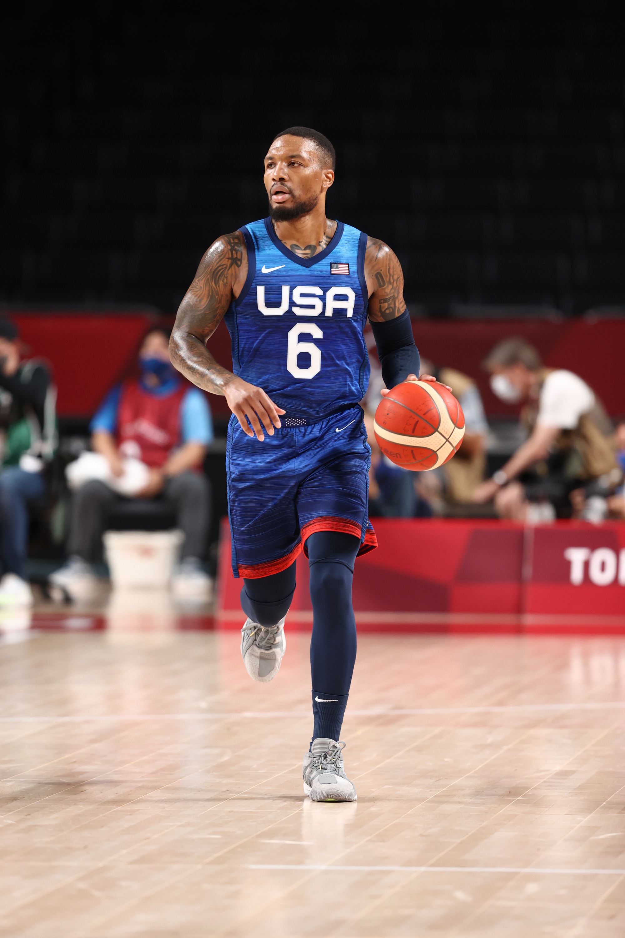 TOKYO, JAPAN - JULY 25: Damian Lillard #6 of the USA Men's National Team drives against Team France at the Saitama Super Arena on July 25, 2021 in Tokyo, Japan. NOTE TO USER: User expressly acknowledges and agrees that, by downloading and/or using this Photograph, user is consenting to the terms and conditions of the Getty Images License Agreement. Mandatory Copyright Notice: Copyright 2021 NBAE (Photo by Ned Dishman/NBAE via Getty Images)