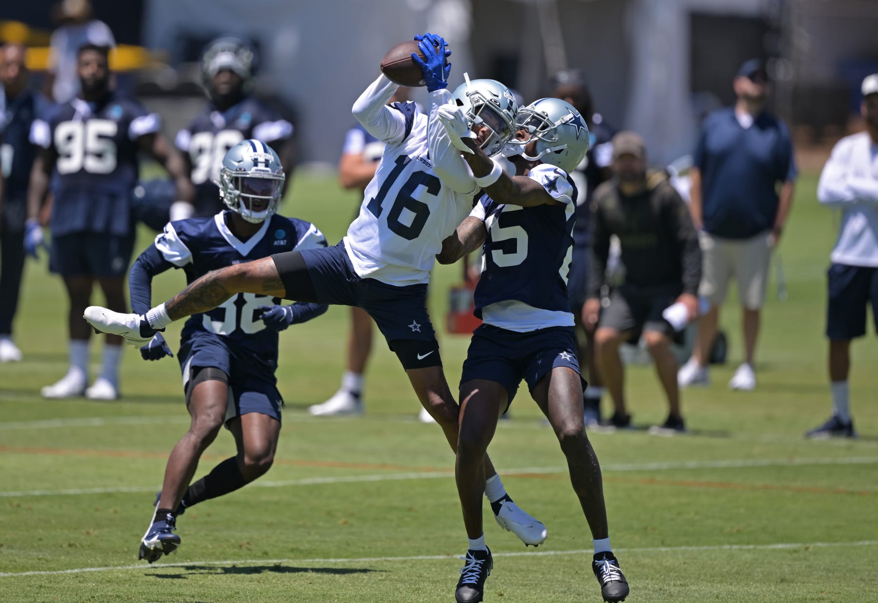 Cowboys WR  Jalen Moreno-Cropper catches a pass over CB Nahshon Wright 