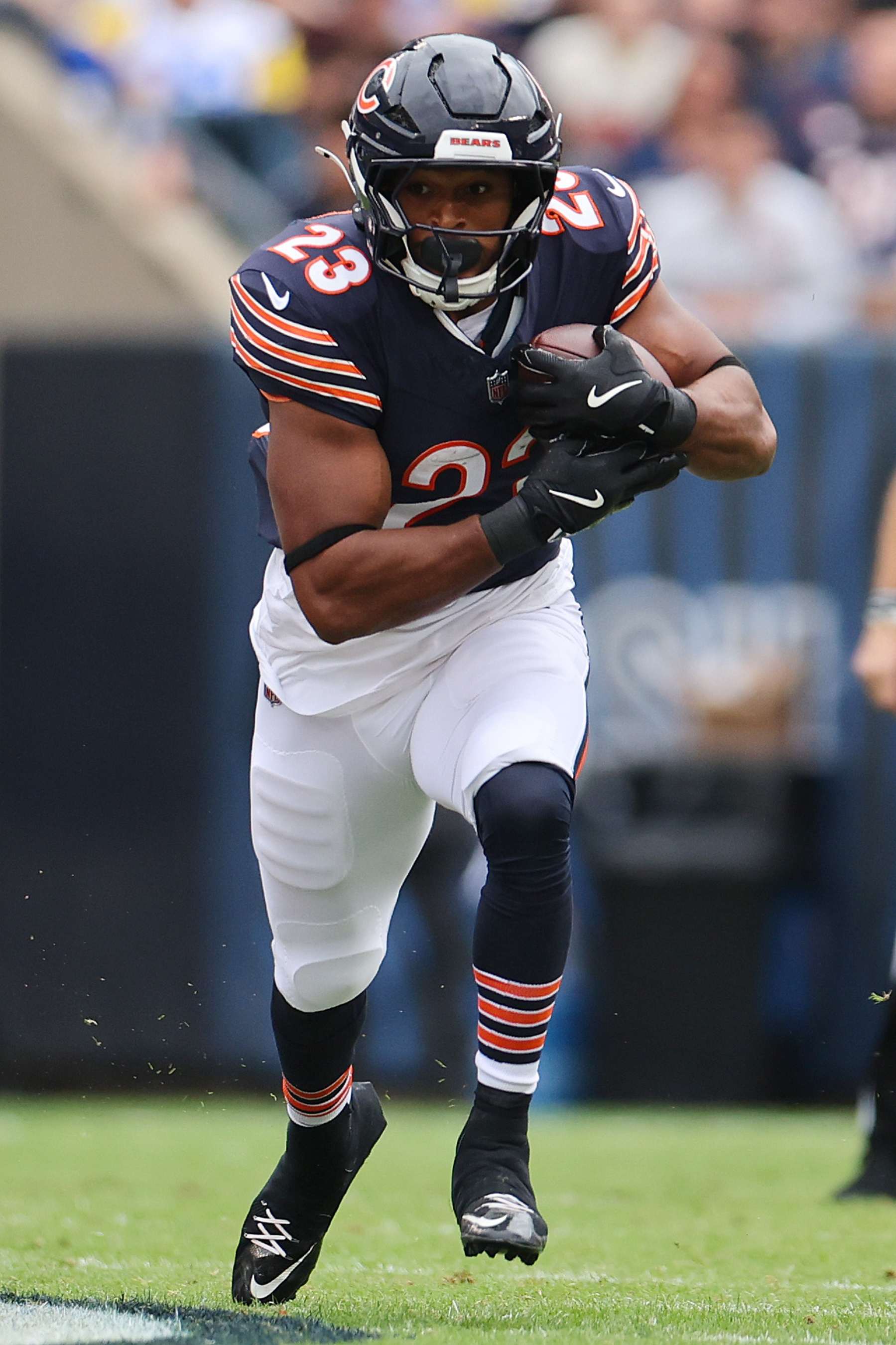 CHICAGO, ILLINOIS - SEPTEMBER 29: Roschon Johnson #23 of the Chicago Bears runs with the ball against the Los Angeles Rams at Soldier Field on September 29, 2024 in Chicago, Illinois. (Photo by Michael Reaves/Getty Images)