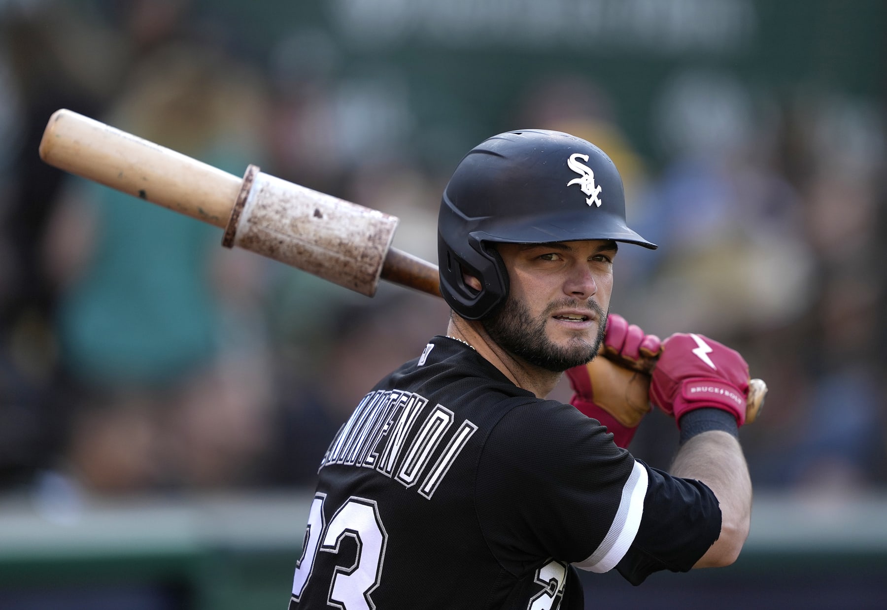 OAKLAND, CALIFORNIA - JUNE 30: Andrew Benintendi #23 of the Chicago White Sox warms up in the on-deck circle prior to the start of the game against the Oakland Athletics at RingCentral Coliseum on June 30, 2023 in Oakland, California. (Photo by Thearon W. Henderson/Getty Images)