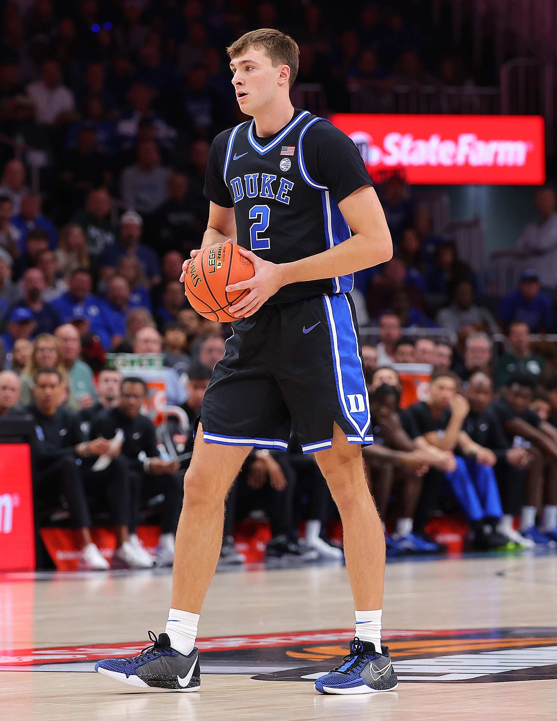 ATLANTA, GEORGIA - NOVEMBER 12:  Cooper Flagg #2 of the Duke Blue Devils stands at the top of the key against the Kentucky Wildcats during the first half of the State Farm Champions Classic between the Kentucky Wildcats and Duke Blue Devils at State Farm Arena on November 12, 2024 in Atlanta, Georgia. (Photo by Kevin C. Cox/Getty Images)