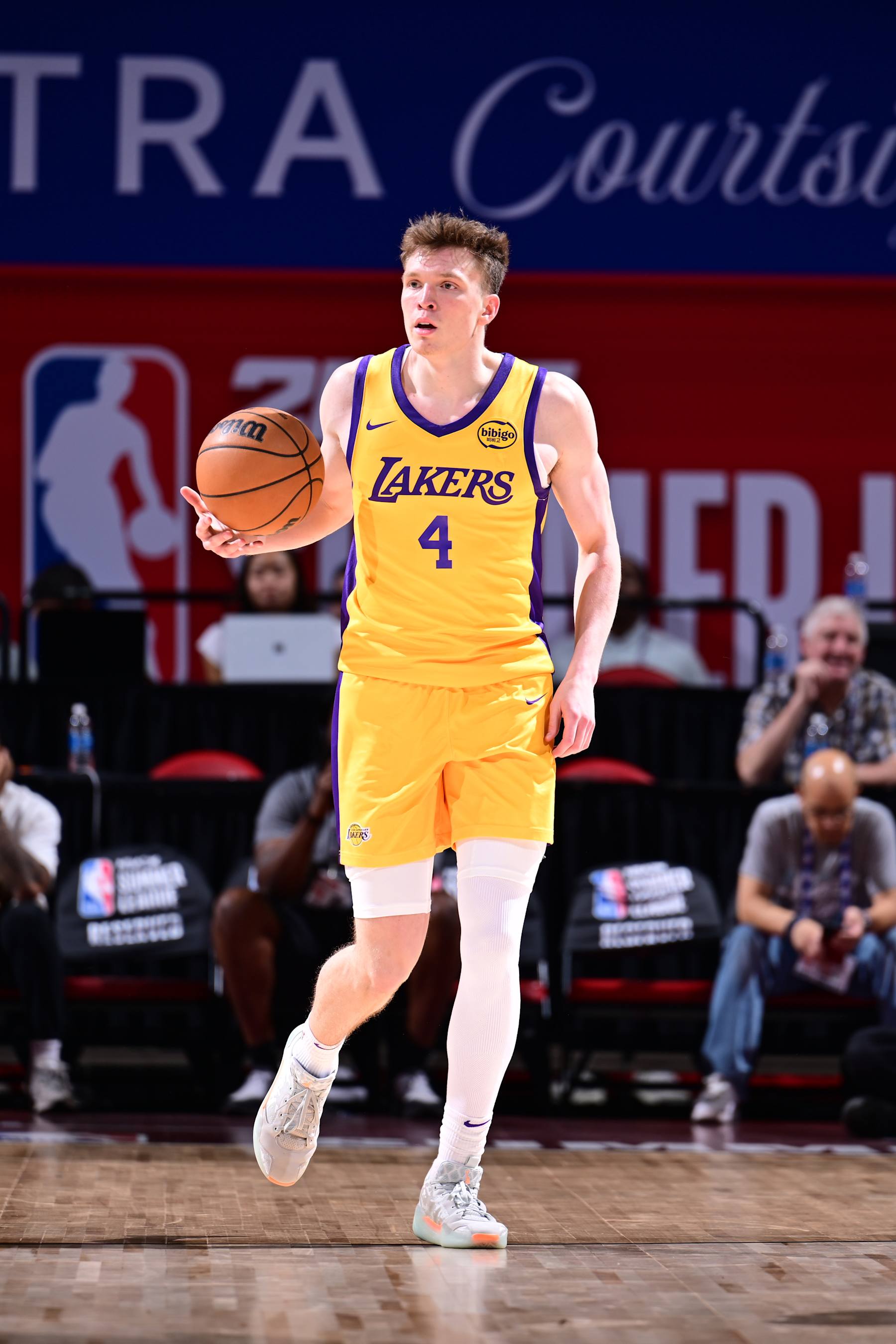 LAS VEGAS, NV - JULY 18: Dalton Knecht #4 of the Los Angeles Lakers handles the ball during the game on July 18, 2024 at the Thomas & Mack Center in Las Vegas, Nevada. NOTE TO USER: User expressly acknowledges and agrees that, by downloading and or using this photograph, User is consenting to the terms and conditions of the Getty Images License Agreement. Mandatory Copyright Notice: Copyright 2024 NBAE (Photo by Adam Hagy/NBAE via Getty Images) LAS VEGAS, NV - JULY 18: Dalton Knecht #4 of the Los Angeles Lakers handles the ball during the game on July 18, 2024 at the Thomas & Mack Center in Las Vegas, Nevada. NOTE TO USER: User expressly acknowledges and agrees that, by downloading and or using this photograph, User is consenting to the terms and conditions of the Getty Images License Agreement. Mandatory Copyright Notice: Copyright 2024 NBAE (Photo by Adam Hagy/NBAE via Getty Images)