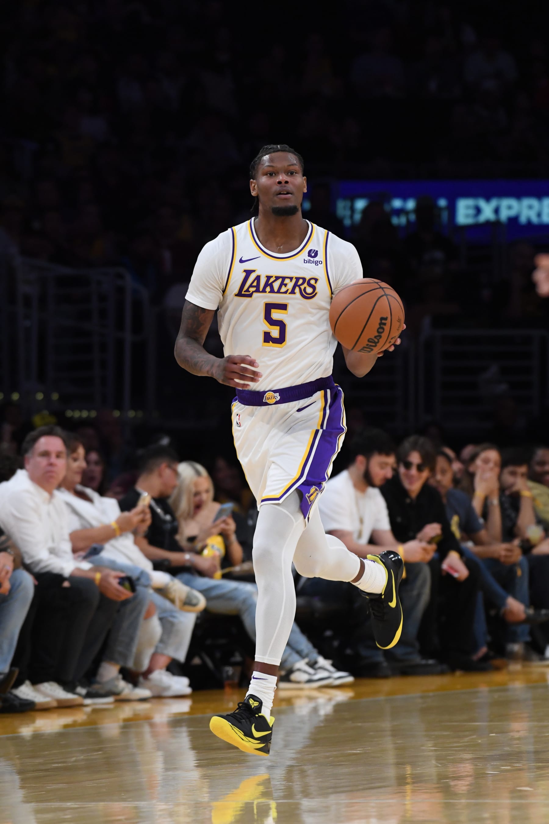 LOS ANGELES, CA - OCTOBER 15: Cam Reddish #5 of the Los Angeles Lakers dribbles the ball during the preseason game on October 15, 2023 at Crypto.Com Arena in Los Angeles, California. NOTE TO USER: User expressly acknowledges and agrees that, by downloading and/or using this Photograph, user is consenting to the terms and conditions of the Getty Images License Agreement. Mandatory Copyright Notice: Copyright 2023 NBAE (Photo by Juan Ocampo/NBAE via Getty Images)
