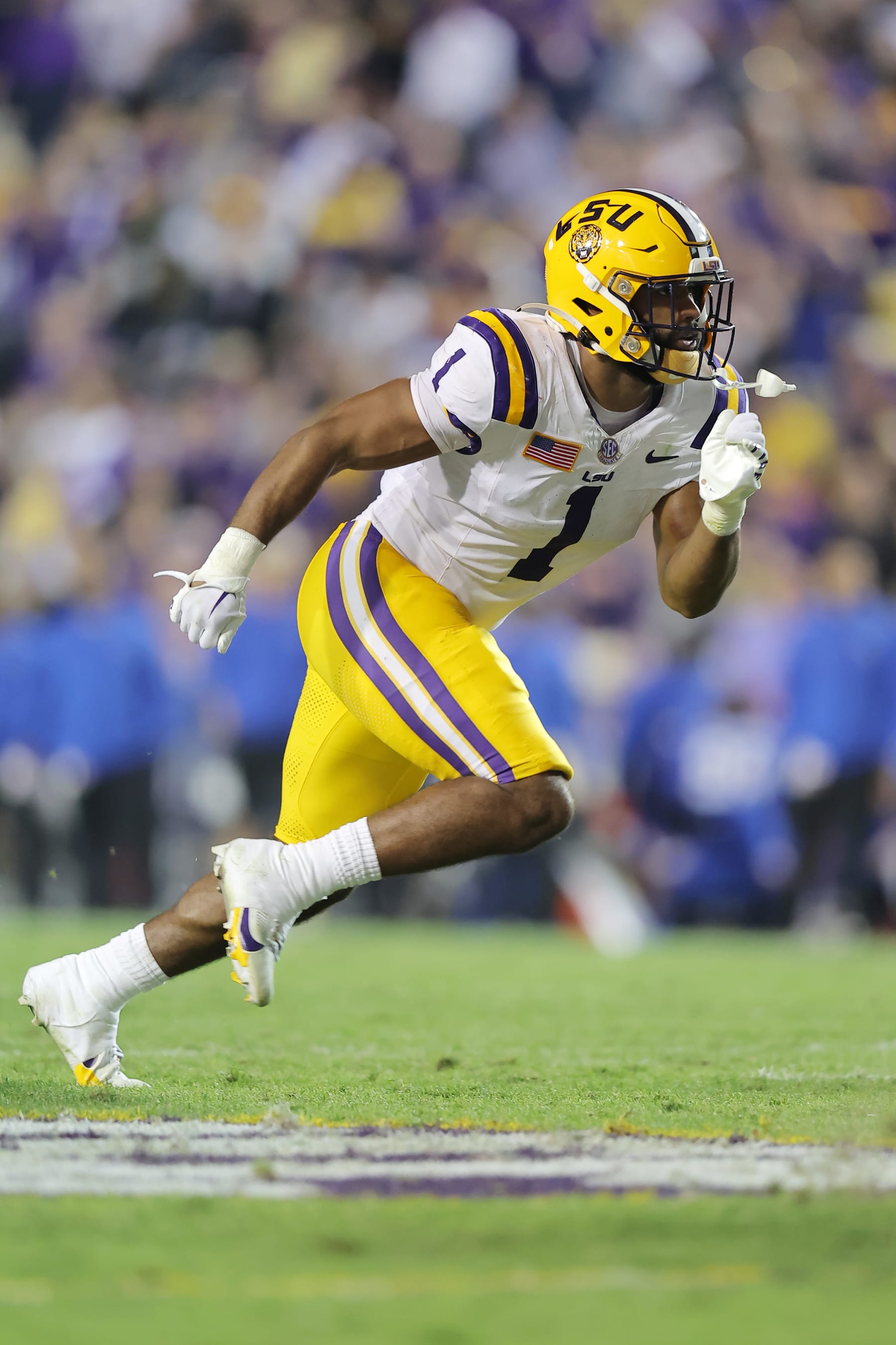 BATON ROUGE, LOUISIANA - NOVEMBER 11: Omar Speights #1 of the LSU Tigers in action against the Florida Gators during a game at Tiger Stadium on November 11, 2023 in Baton Rouge, Louisiana. (Photo by Jonathan Bachman/Getty Images)
