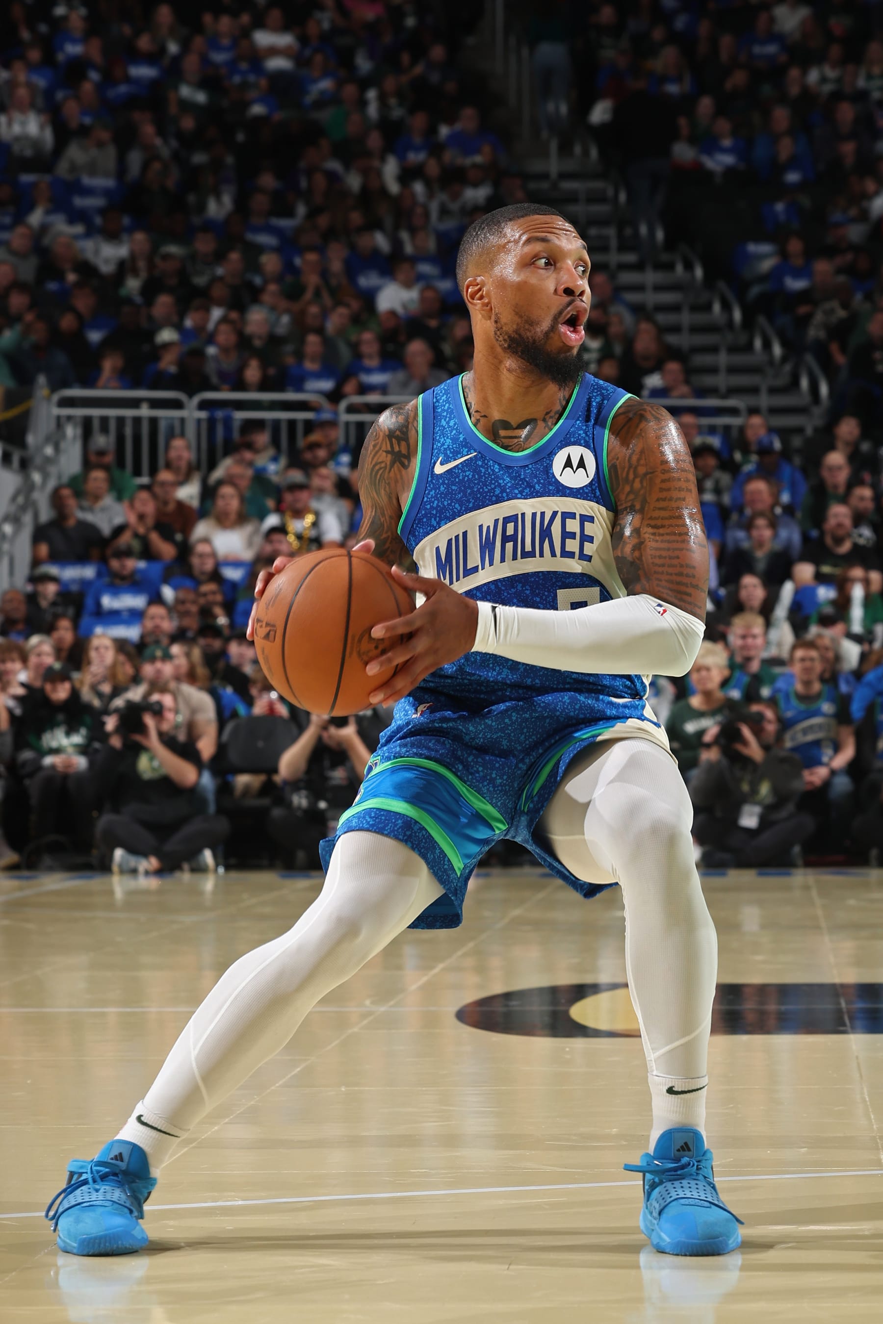 MILWAUKEE, WI -  NOVEMBER 3: Damian Lillard #0 of the Milwaukee Bucks  looks to pass the ball during the game against the New York Knicks on November 3, 2023 at Fiserv Forum in Milwaukee, Wisconsin. NOTE TO USER: User expressly acknowledges and agrees that, by downloading and or using this Photograph, user is consenting to the terms and conditions of the Getty Images License Agreement. Mandatory Copyright Notice: Copyright 2023 NBAE (Photo by David Sherman/NBAE via Getty Images)