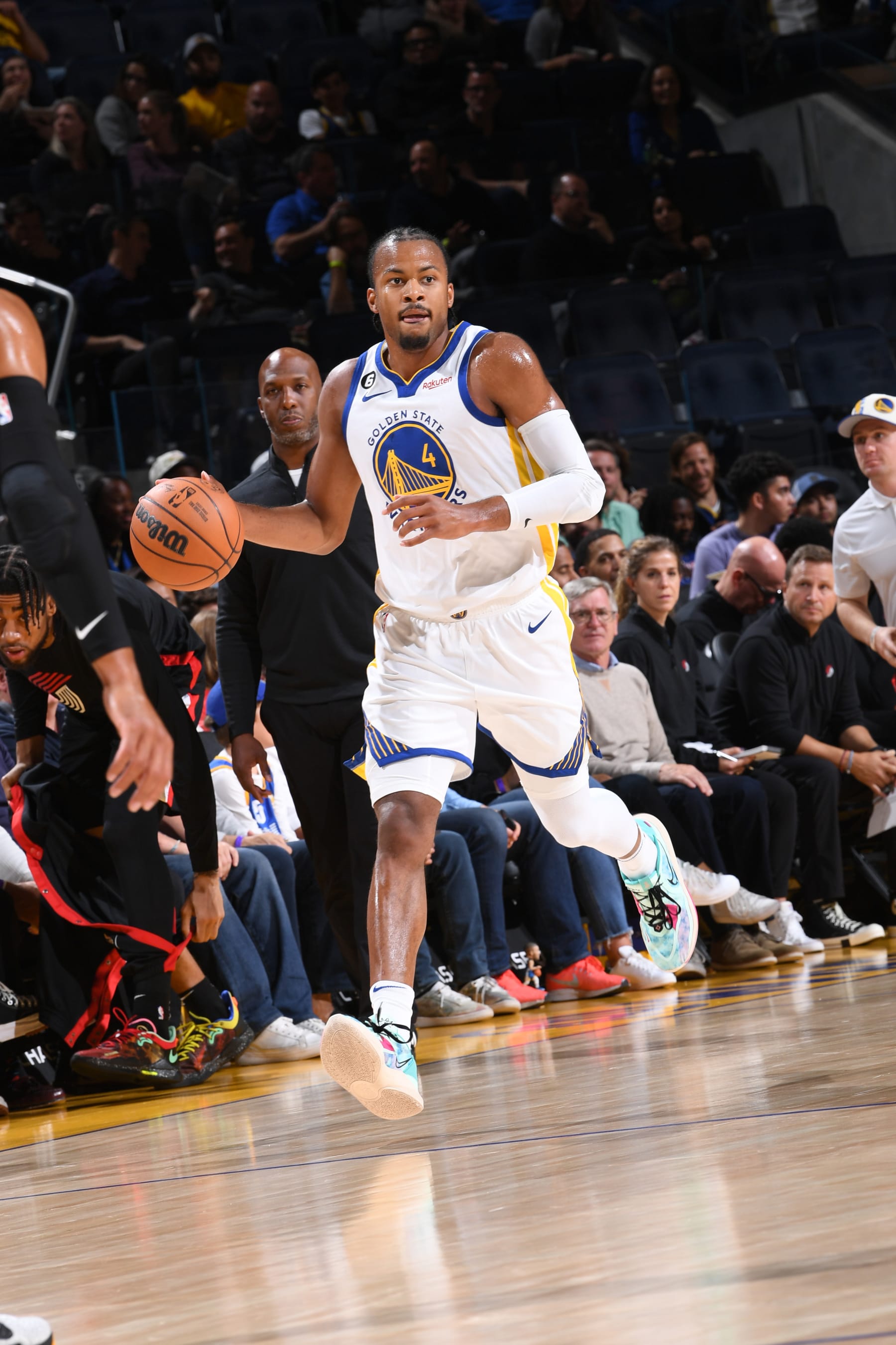 SAN FRANCISCO, CA - OCTOBER 11: Moses Moody #4 of the Golden State Warriors dribbles the ball against the Portland Trail Blazers during a preseason game on October 11, 2022 at Chase Center in San Francisco, California. NOTE TO USER: User expressly acknowledges and agrees that, by downloading and or using this photograph, user is consenting to the terms and conditions of Getty Images License Agreement. Mandatory Copyright Notice: Copyright 2022 NBAE (Photo by Noah Graham/NBAE via Getty Images)