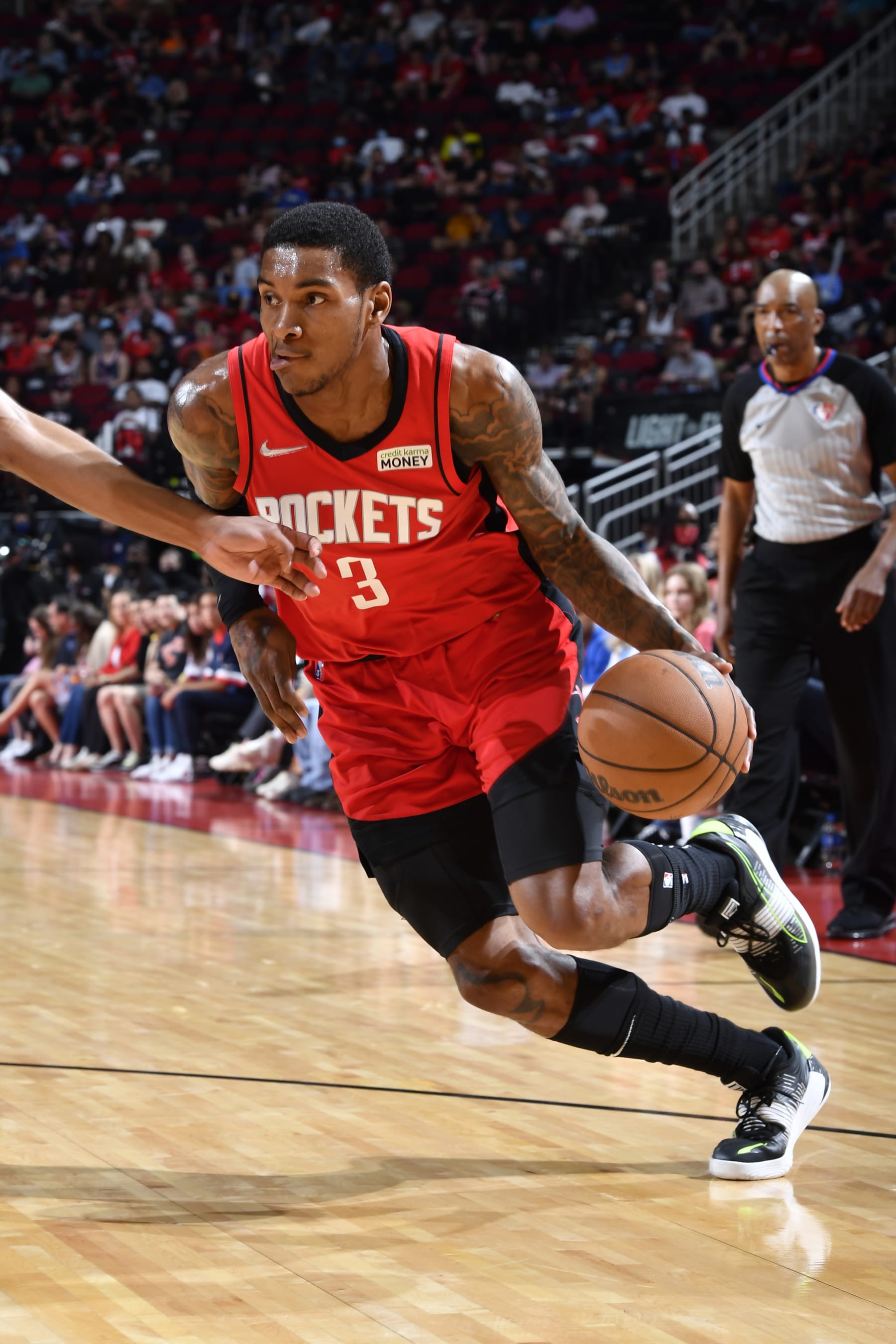 HOUSTON, TX - APRIL 10: Kevin Porter Jr. #3 of the Houston Rockets drives to the basket during the game against the Atlanta Hawks on April 10, 2022 at the Toyota Center in Houston, Texas. NOTE TO USER: User expressly acknowledges and agrees that, by downloading and or using this photograph, User is consenting to the terms and conditions of the Getty Images License Agreement. Mandatory Copyright Notice: Copyright 2022 NBAE (Photo by Logan Riely/NBAE via Getty Images)