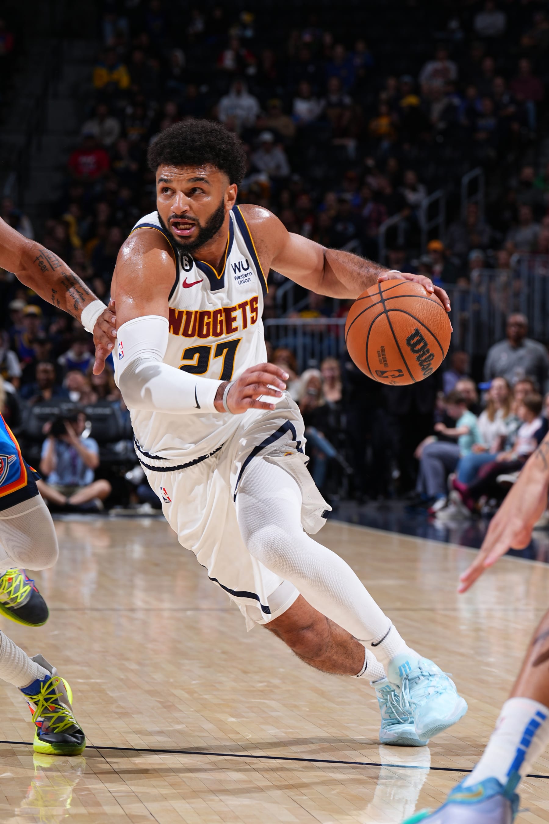 DENVER, CO - OCTOBER 3: Jamal Murray #27 of the Denver Nuggets drives to the basket during the game against the Oklahoma City Thunder on October 3, 2022 at the Ball Arena in Denver, Colorado. NOTE TO USER: User expressly acknowledges and agrees that, by downloading and/or using this Photograph, user is consenting to the terms and conditions of the Getty Images License Agreement. Mandatory Copyright Notice: Copyright 2022 NBAE (Photo by Garrett Ellwood/NBAE via Getty Images)