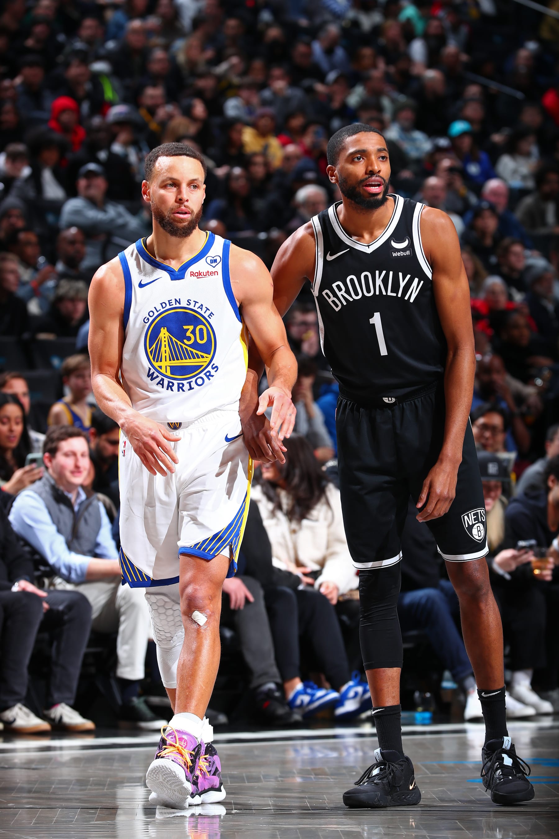 Stephen Curry and Mikal Bridges
