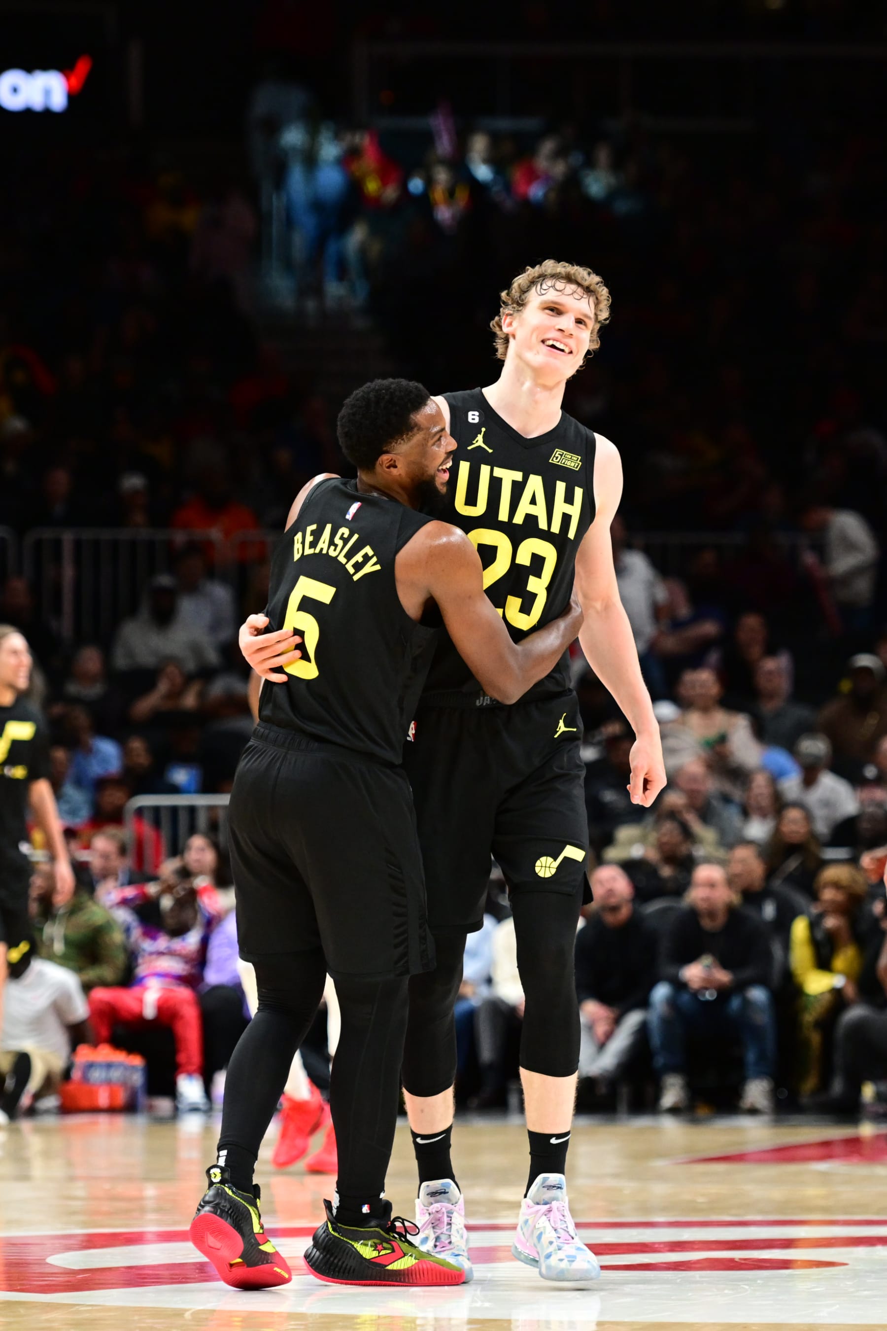 ATLANTA, GA - NOVEMBER 9: Malik Beasley #5 of the Utah Jazz embraces Lauri Markkanen #23 during the game against the Atlanta Hawks on November 9, 2022 at State Farm Arena in Atlanta, Georgia.  NOTE TO USER: User expressly acknowledges and agrees that, by downloading and/or using this Photograph, user is consenting to the terms and conditions of the Getty Images License Agreement. Mandatory Copyright Notice: Copyright 2022 NBAE (Photo by Adam Hagy/NBAE via Getty Images)