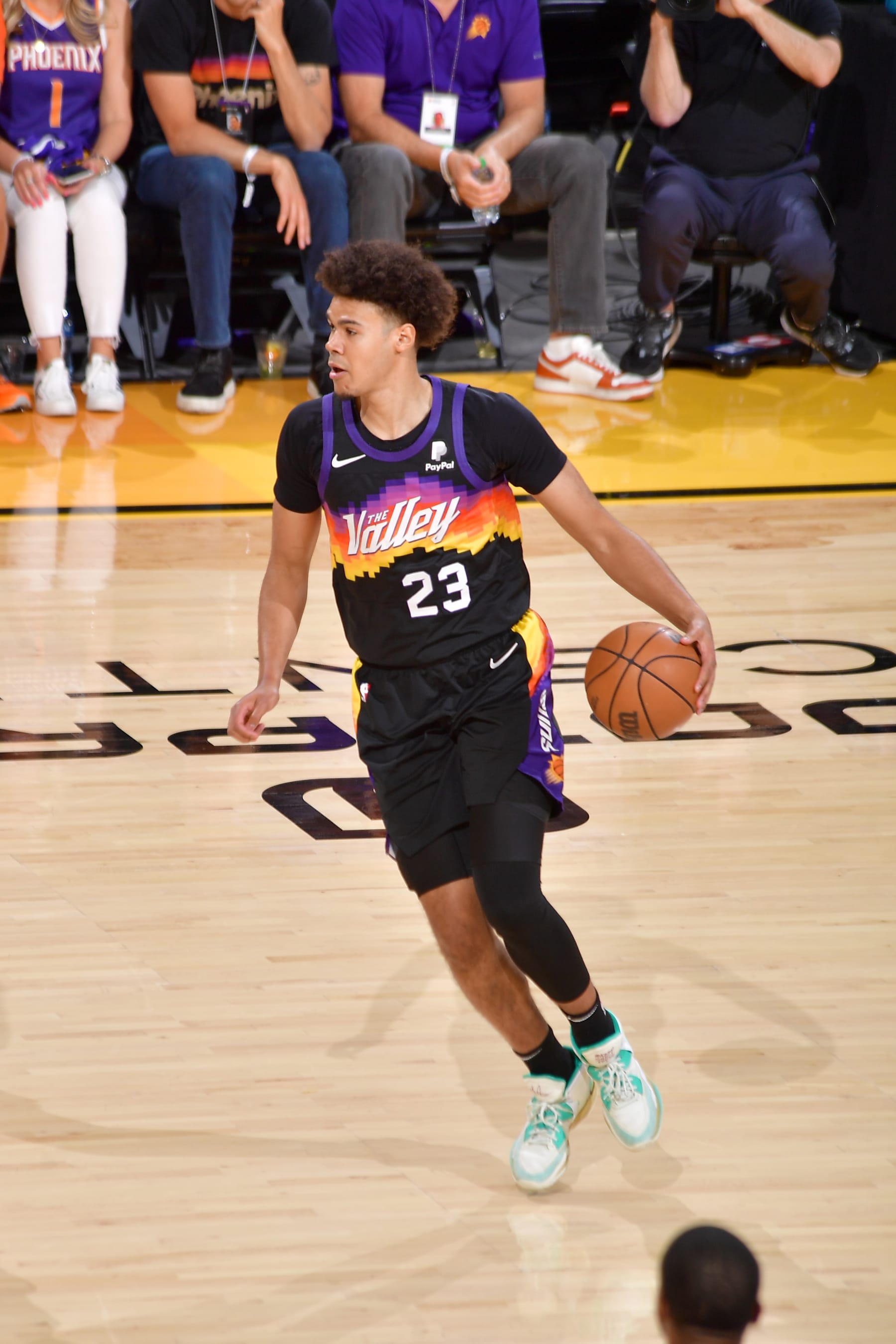 PHOENIX, AZ - MAY 15: Cameron Johnson #23 of the Phoenix Suns dribbles the ball during the game against the Dallas Mavericks during Game 7 of the 2022 NBA Playoffs Western Conference Semifinals on May 15, 2022 at Footprint Center in Phoenix, Arizona. NOTE TO USER: User expressly acknowledges and agrees that, by downloading and or using this photograph, user is consenting to the terms and conditions of the Getty Images License Agreement. Mandatory Copyright Notice: Copyright 2022 NBAE (Photo by Michael Gonzales/NBAE via Getty Images)