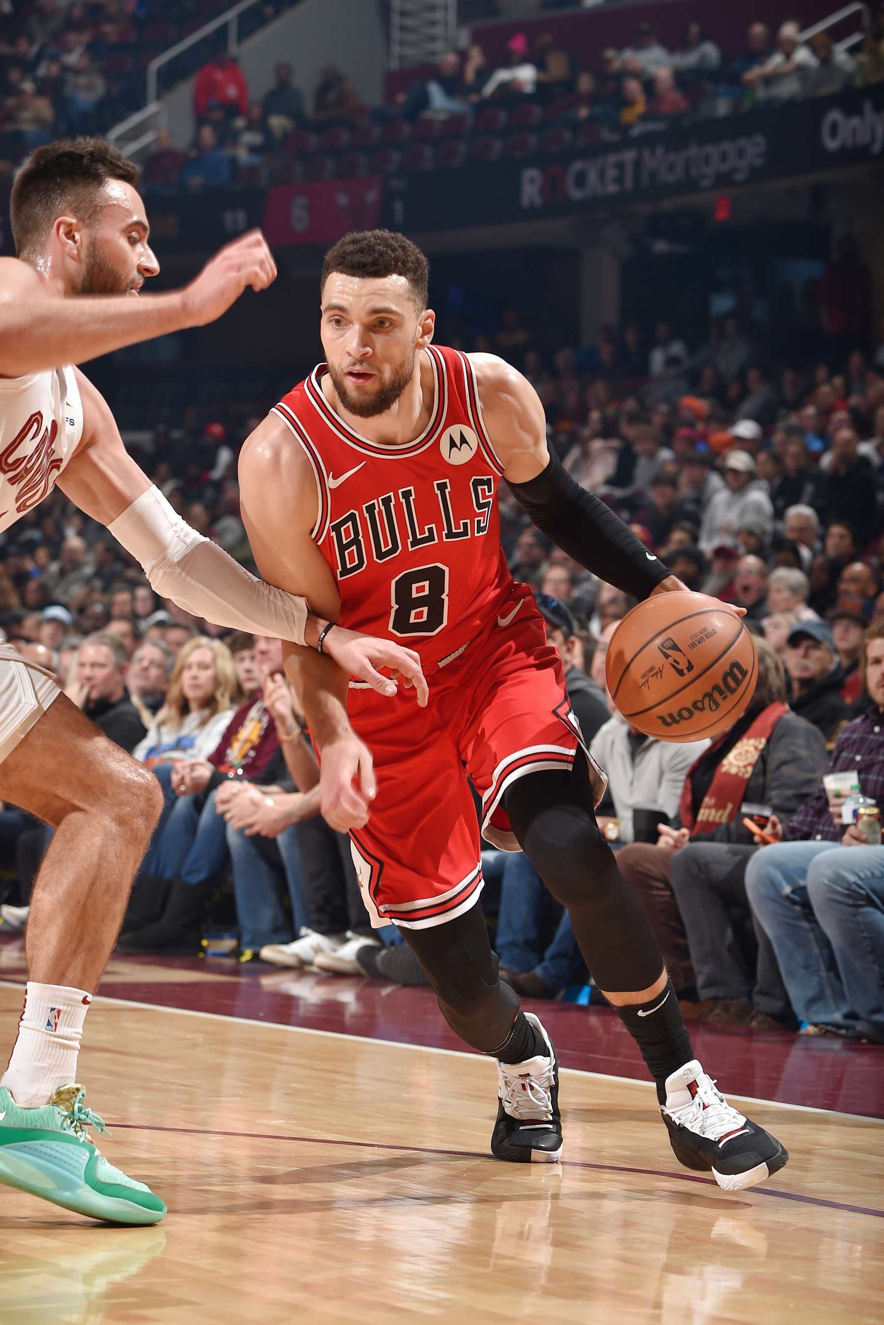 CLEVELAND, OH - JANUARY 15: Zach LaVine #8 of the Chicago Bulls dribbles the ball during the game against the Cleveland Cavaliers on January 15, 2024 at Rocket Mortgage FieldHouse in Cleveland, Ohio. NOTE TO USER: User expressly acknowledges and agrees that, by downloading and/or using this Photograph, user is consenting to the terms and conditions of the Getty Images License Agreement. Mandatory Copyright Notice: Copyright 2024 NBAE (Photo by David Liam Kyle/NBAE via Getty Images)