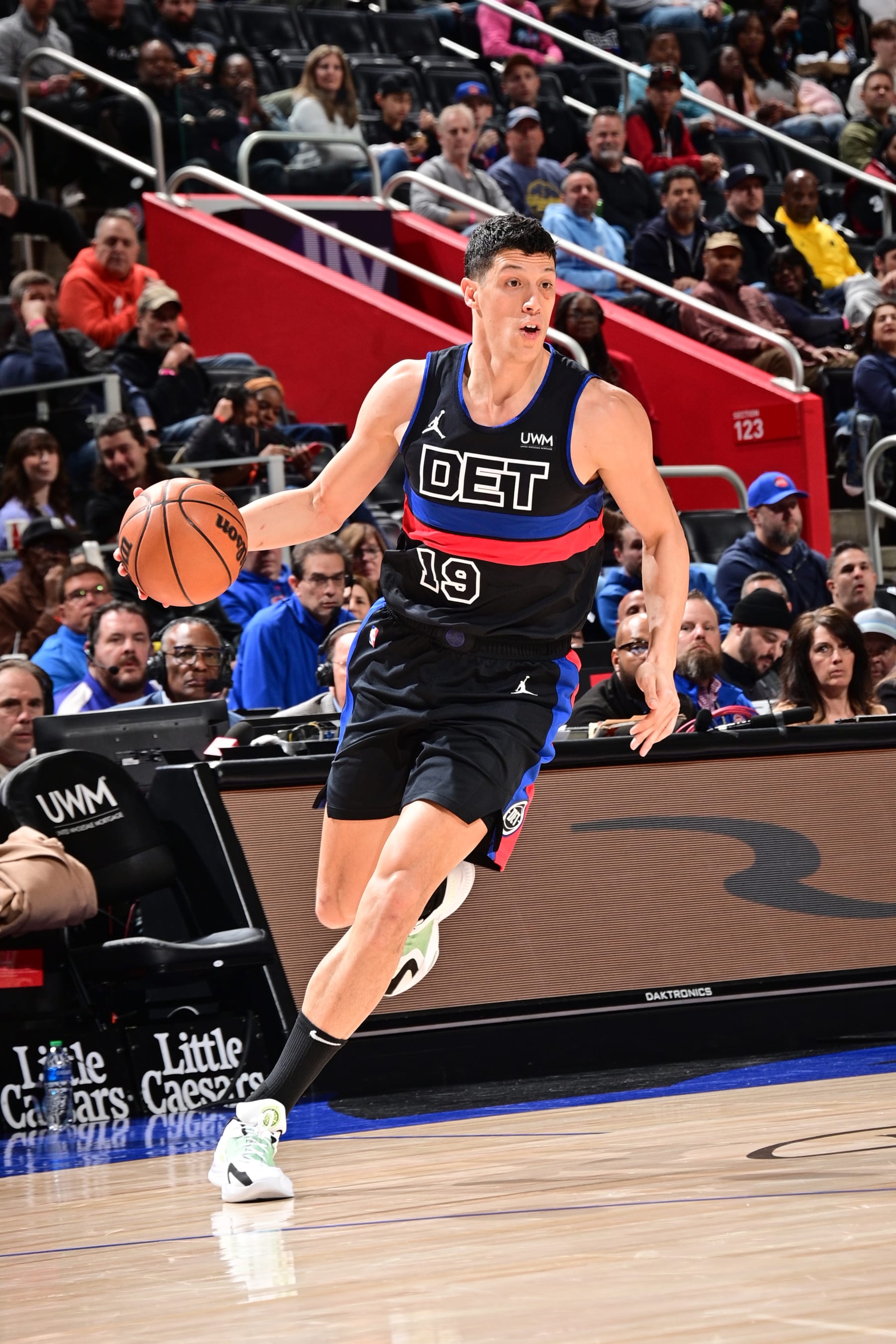 DETROIT, MI - MARCH 15: Simone Fontecchio #19 of the Detroit Pistons handles the ball during the game against the Miami Heat on March 15, 2024 at Little Caesars Arena in Detroit, Michigan. NOTE TO USER: User expressly acknowledges and agrees that, by downloading and/or using this photograph, User is consenting to the terms and conditions of the Getty Images License Agreement. Mandatory Copyright Notice: Copyright 2024 NBAE (Photo by Chris Schwegler/NBAE via Getty Images)