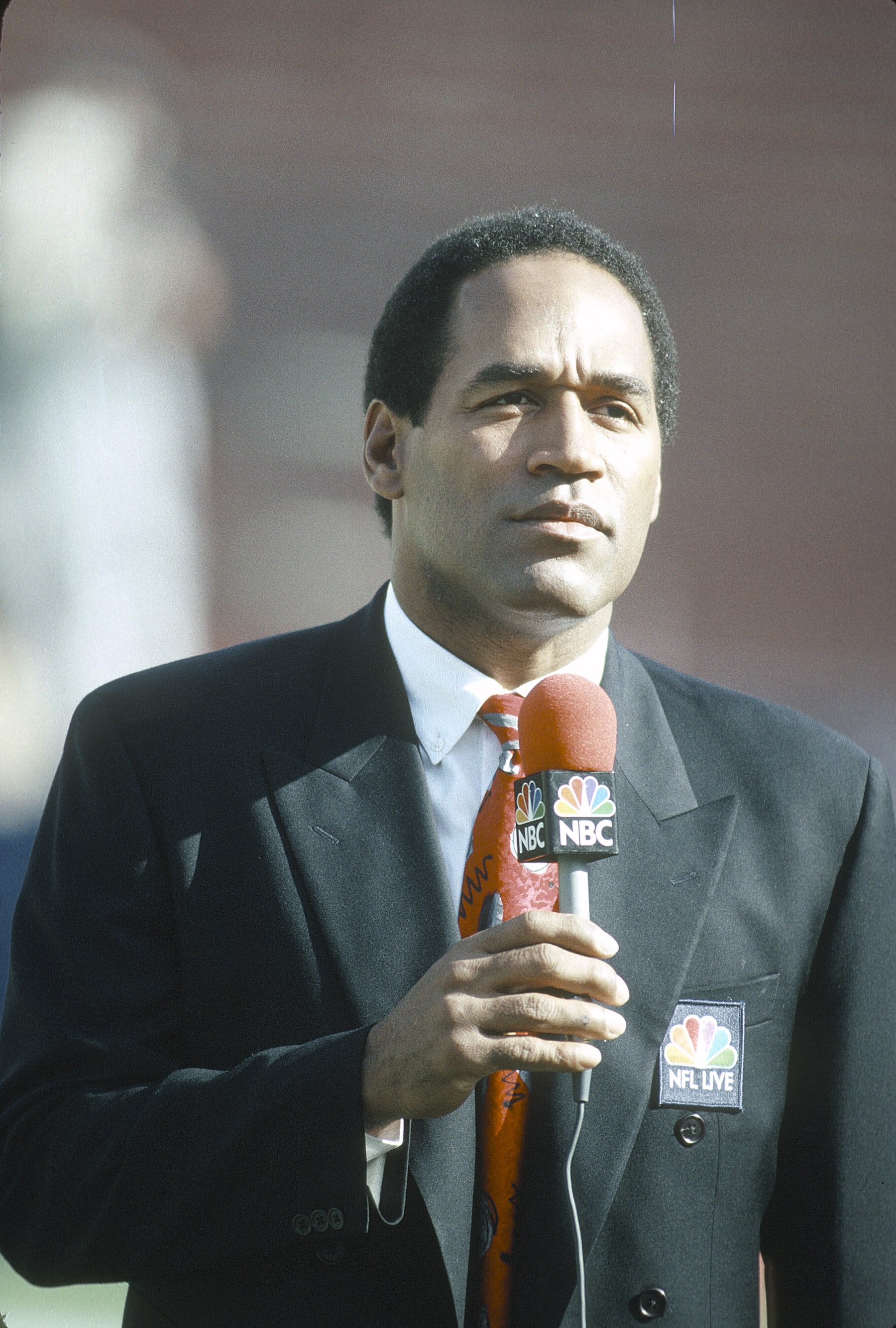 UNSPECIFIED - CIRCA 1991: NBC Football Analyst O.J. Simpson on the air before the start of an NFL football game circa 1991. (Photo by Focus on Sport/Getty Images)