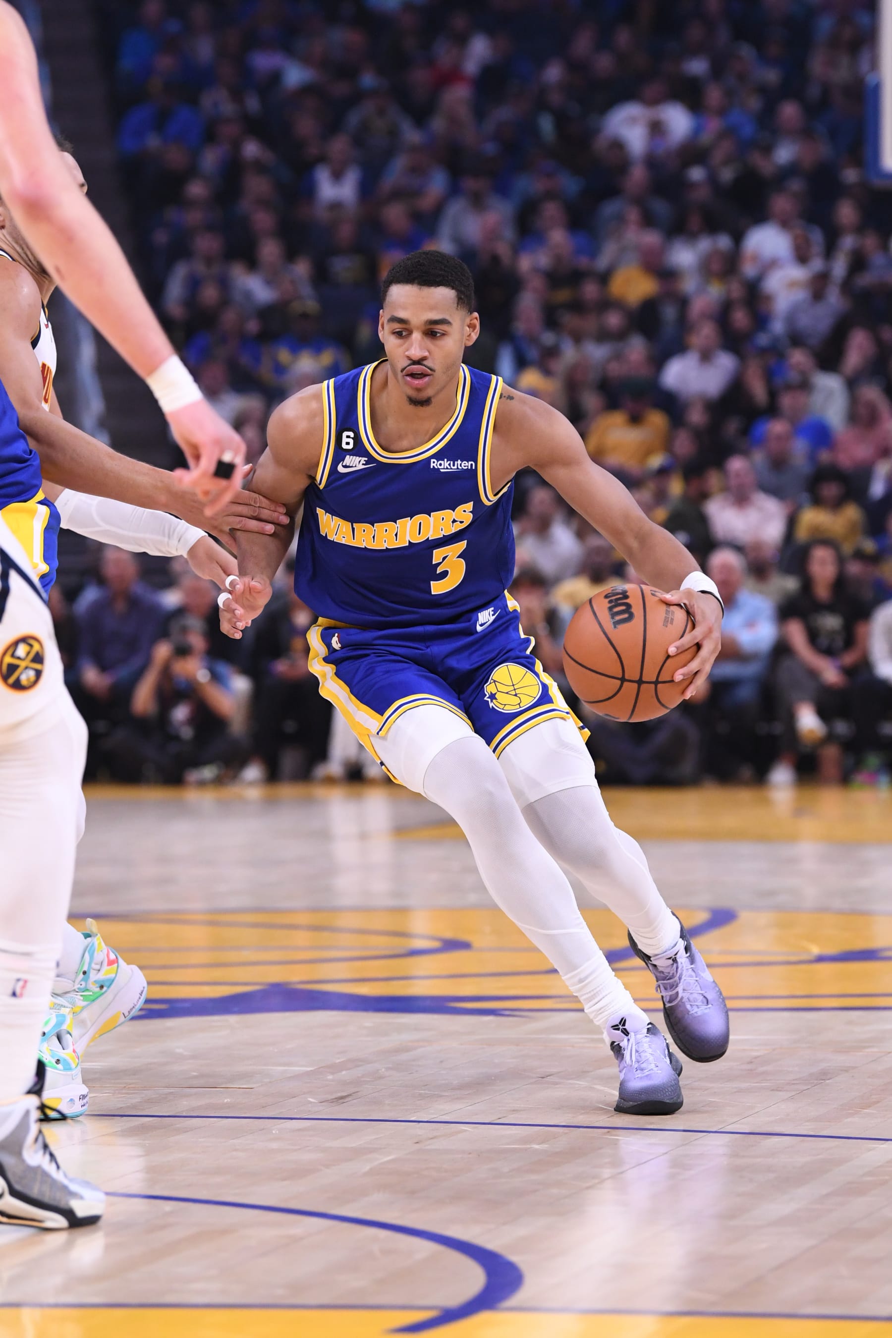 SAN FRANCISCO, CA - OCTOBER 21: Jordan Poole #3 of the Golden State Warriors drives to the basket during the game against the Denver Nuggets on October 21, 2022 at Chase Center in San Francisco, California. NOTE TO USER: User expressly acknowledges and agrees that, by downloading and or using this photograph, user is consenting to the terms and conditions of Getty Images License Agreement. Mandatory Copyright Notice: Copyright 2022 NBAE (Photo by Noah Graham/NBAE via Getty Images)
