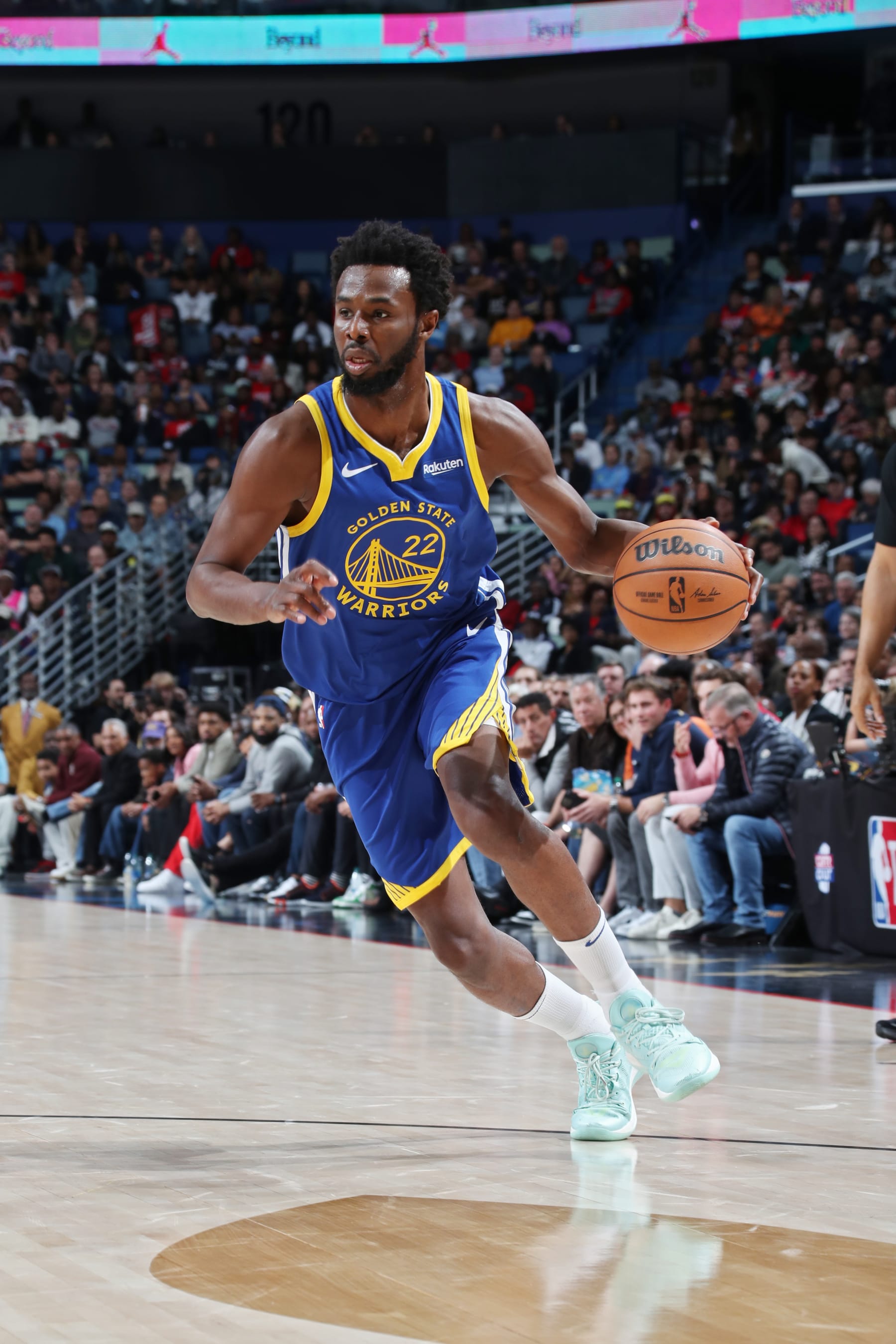 NEW ORLEANS, LA - OCTOBER 30: Andrew Wiggins #22 of the Golden State Warriors dribbles the ball during the game against the New Orleans Pelicans on October 30, 2023 at the Smoothie King Center in New Orleans, Louisiana. NOTE TO USER: User expressly acknowledges and agrees that, by downloading and or using this Photograph, user is consenting to the terms and conditions of the Getty Images License Agreement. Mandatory Copyright Notice: Copyright 2023 NBAE (Photo by Layne Murdoch Jr./NBAE via Getty Images)