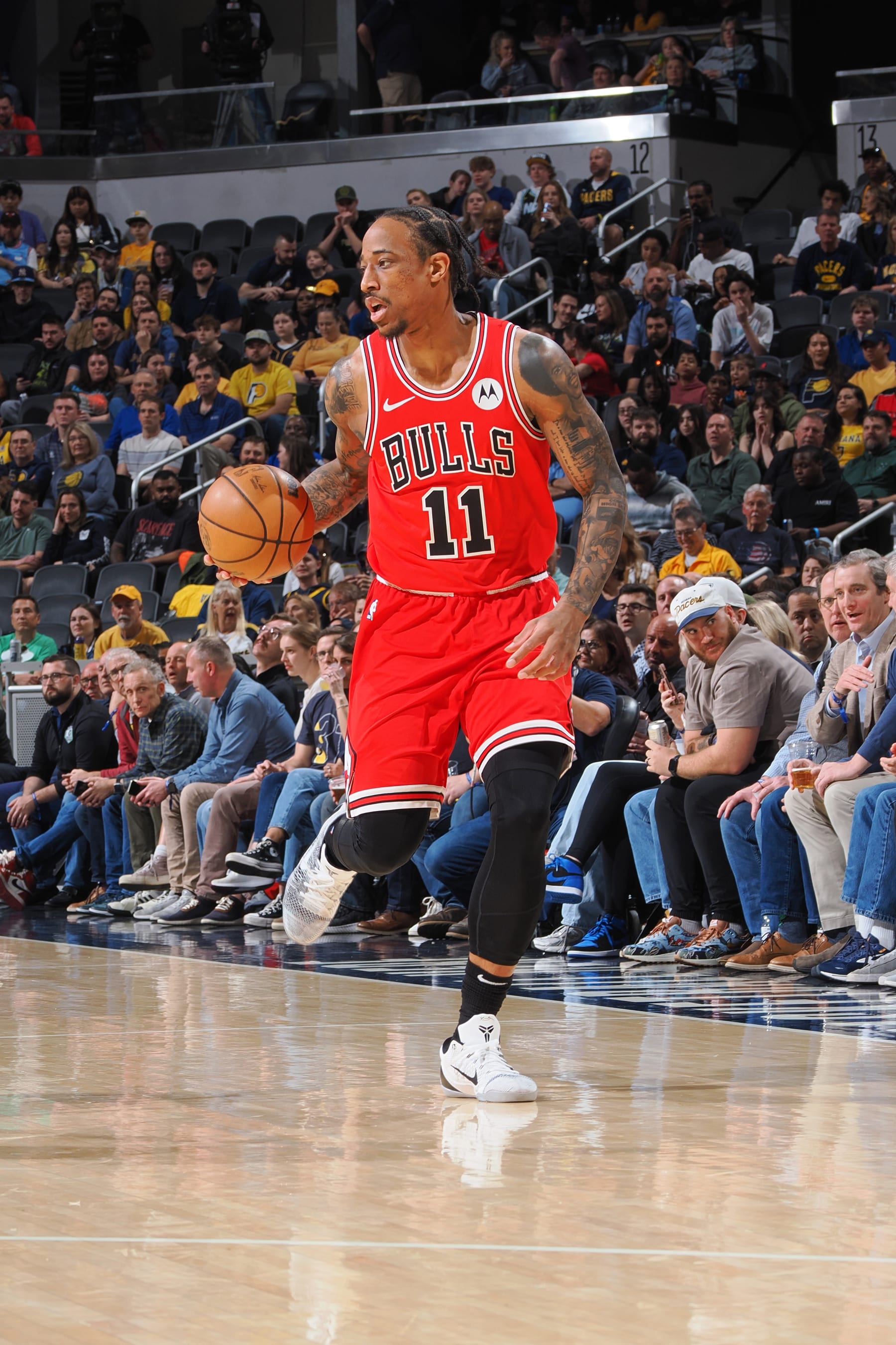 INDIANAPOLIS, IN - MARCH 13:  DeMar DeRozan #11 of the Chicago Bulls handles the ball during the game  on March 13, 2024 at Gainbridge Fieldhouse in Indianapolis, Indiana. NOTE TO USER: User expressly acknowledges and agrees that, by downloading and or using this Photograph, user is consenting to the terms and conditions of the Getty Images License Agreement. Mandatory Copyright Notice: Copyright 2024 NBAE (Photo by Ron Hoskins/NBAE via Getty Images)