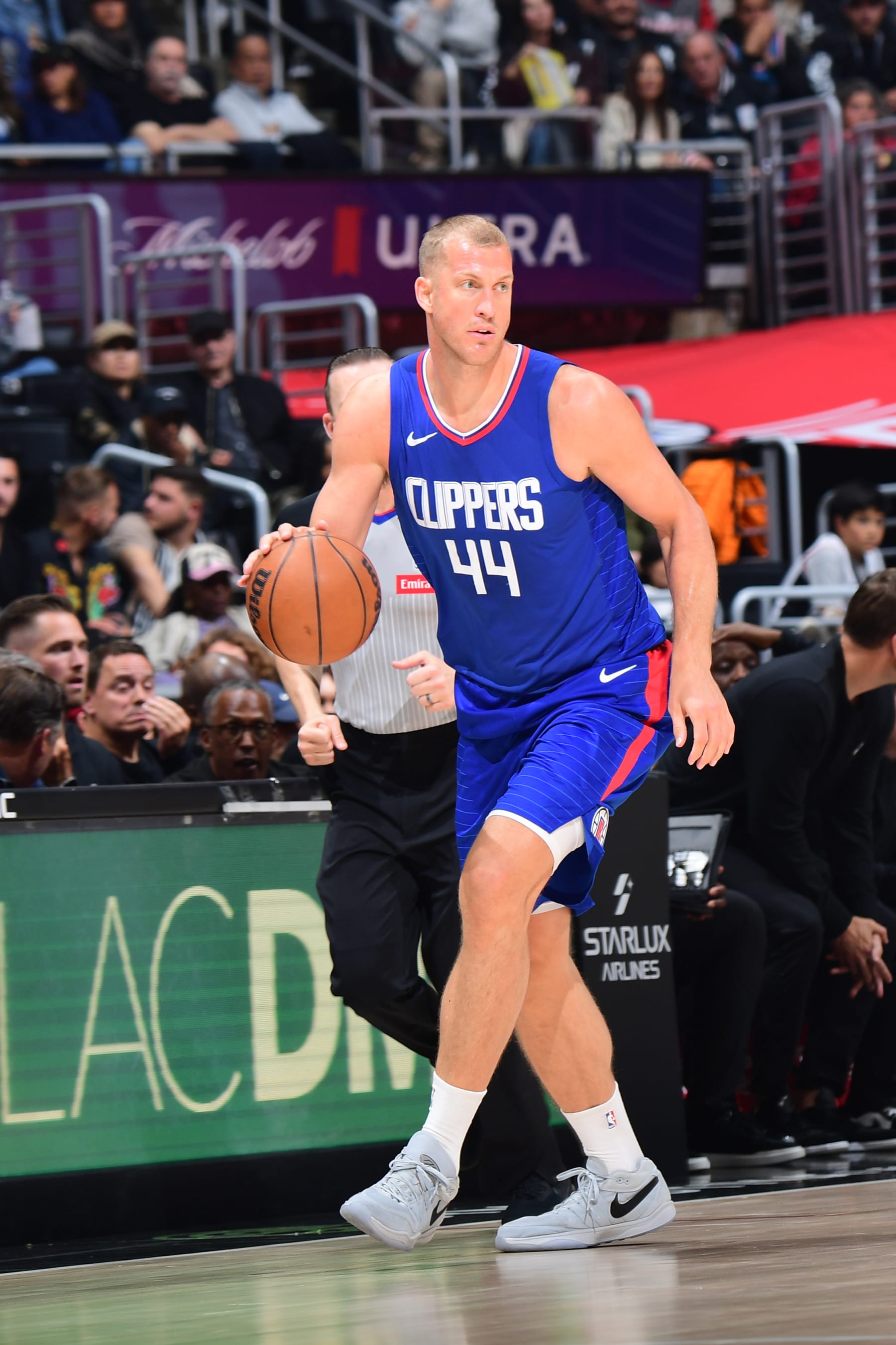 LOS ANGELES, CA - APRIL 12: Mason Plumlee #44 of the LA Clippers dribbles the ball during the game against the Utah Jazz on April 12, 2024 at Crypto.Com Arena in Los Angeles, California. NOTE TO USER: User expressly acknowledges and agrees that, by downloading and/or using this Photograph, user is consenting to the terms and conditions of the Getty Images License Agreement. Mandatory Copyright Notice: Copyright 2024 NBAE (Photo by Adam Pantozzi/NBAE via Getty Images)