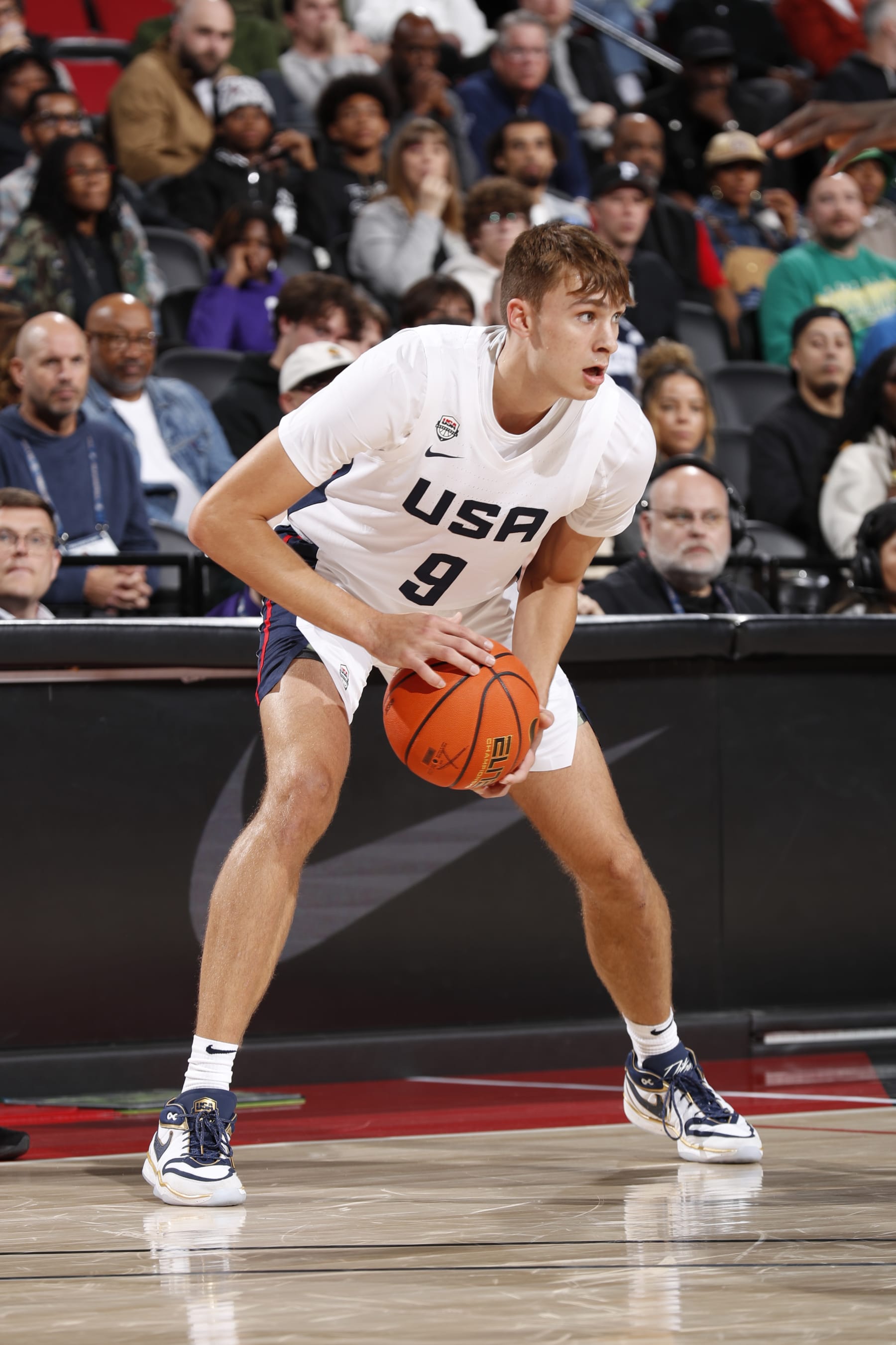PORTLAND, OR - APRIL 13: Cooper Flagg #9 of Team USA handles the ball during the game against Team World  during the 2024 Nike Hoop Summit on April 13, 2024 at the Moda Center Arena in Portland, Oregon. NOTE TO USER: User expressly acknowledges and agrees that, by downloading and or using this photograph, user is consenting to the terms and conditions of the Getty Images License Agreement. Mandatory Copyright Notice: Copyright 2024 NBAE (Photo by Cameron Browne/NBAE via Getty Images)