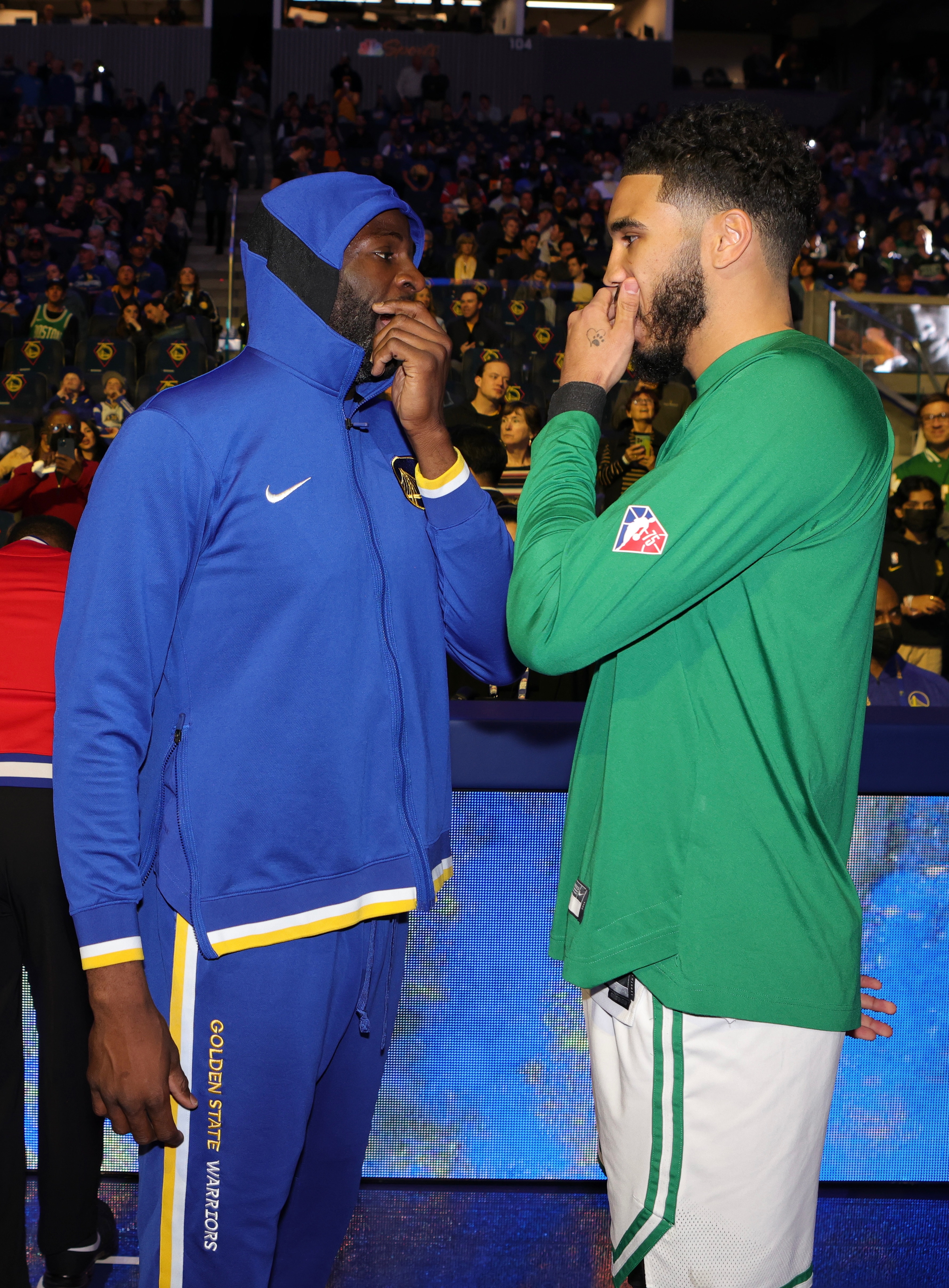 SAN FRANCISCO, CA - MARCH 16: Draymond Green #23 of the Golden State Warriors talks with Jayson Tatum #0 of the Boston Celtics prior to the game on March 16, 2022 at Chase Center in San Francisco, California. NOTE TO USER: User expressly acknowledges and agrees that, by downloading and or using this photograph, user is consenting to the terms and conditions of Getty Images License Agreement. Mandatory Copyright Notice: Copyright 2022 NBAE (Photo by  Jim Poorten/NBAE via Getty Images)