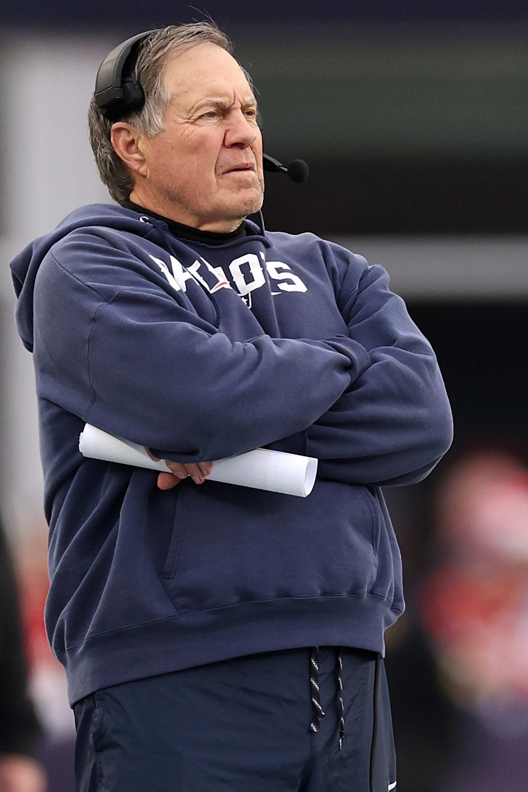 FOXBOROUGH, MASSACHUSETTS - DECEMBER 17: New England Patriots head coach Bill Belichick looks on from the sideline during the game against the Kansas City Chiefs at Gillette Stadium on December 17, 2023 in Foxborough, Massachusetts. (Photo by Maddie Meyer/Getty Images)