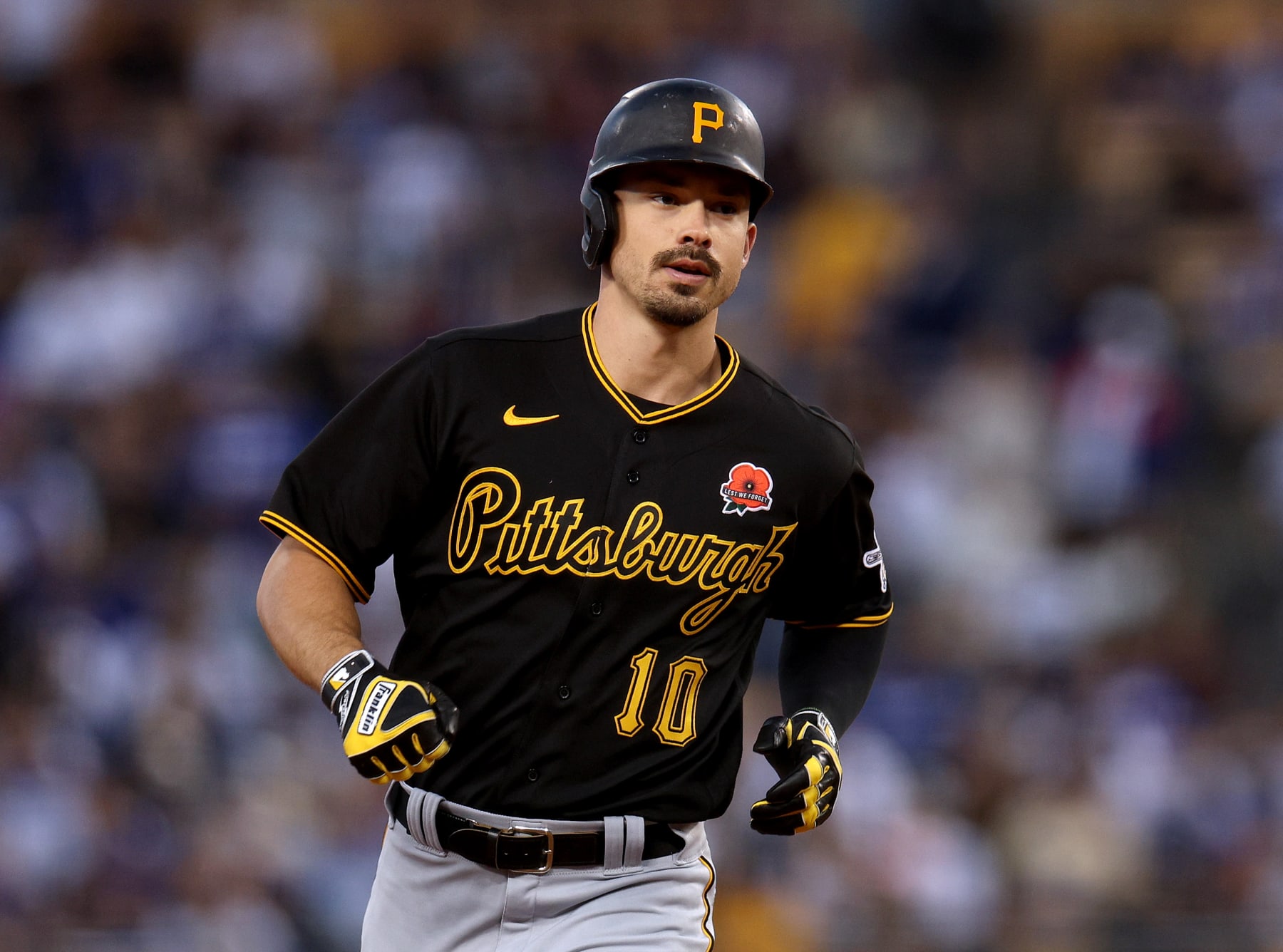 LOS ANGELES, CALIFORNIA - MAY 30: Bryan Reynolds #10 of the Pittsburgh Pirates runs the bases after his solo homerun, to take a 4-0 lead over the Los Angeles Dodgers, during the third inning at Dodger Stadium on May 30, 2022 in Los Angeles, California. (Photo by Harry How/Getty Images)