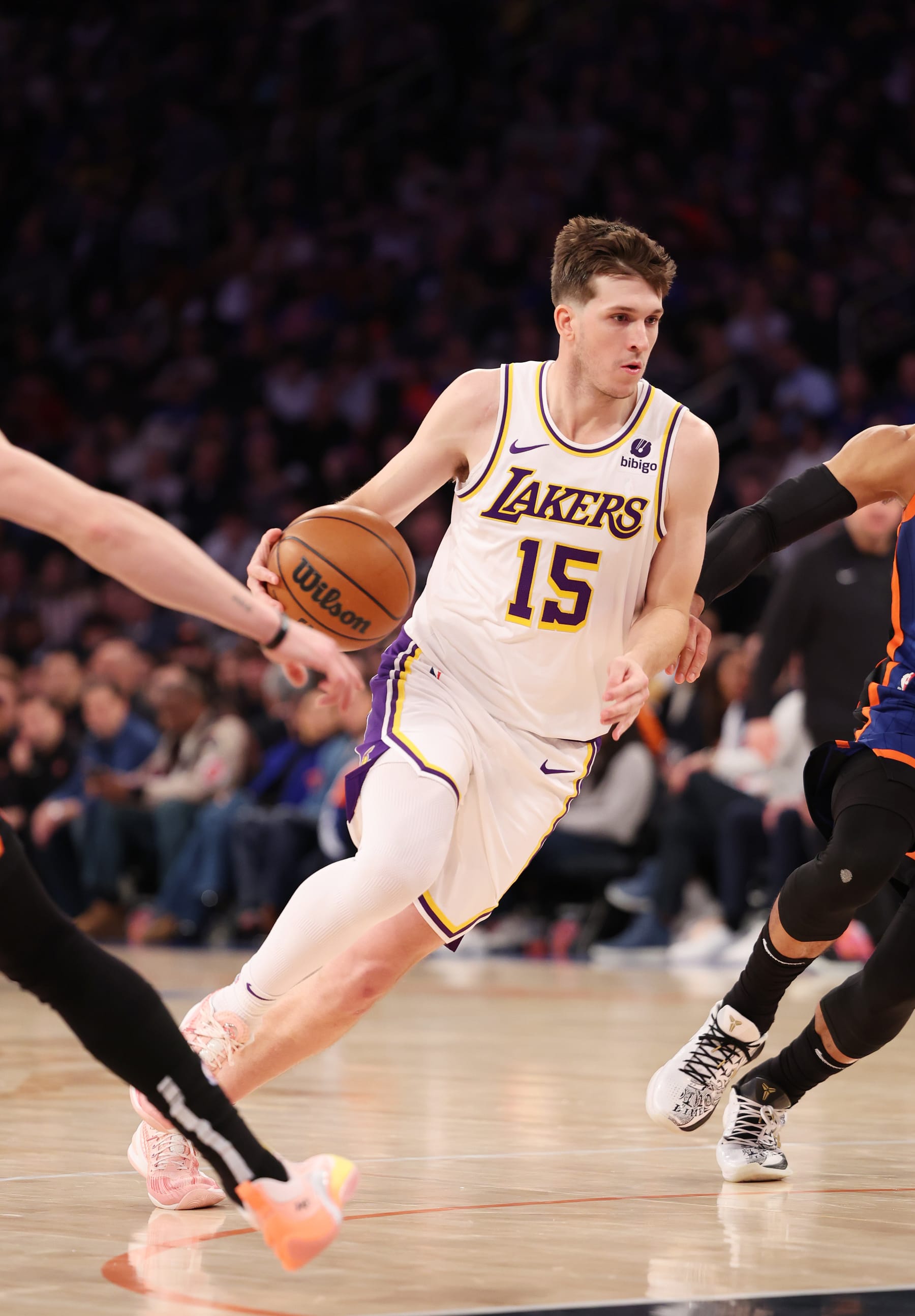 NEW YORK, NEW YORK - FEBRUARY 03: Austin Reaves #15 of the Los Angeles Lakers drives against the New York Knicks during their game at Madison Square Garden on February 03, 2024 in New York City.   User expressly acknowledges and agrees that, by downloading and or using this photograph, User is consenting to the terms and conditions of the Getty Images License Agreement.  (Photo by Al Bello/Getty Images)